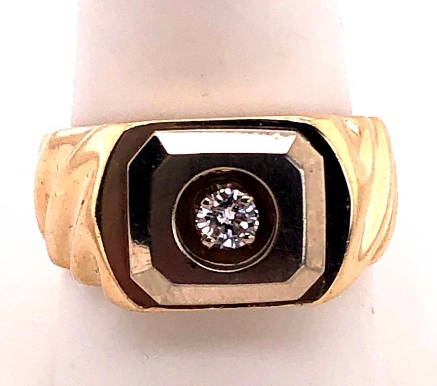 14 Karat Yellow Gold Fashion Ring with round Diamond Size 10.
0.25 total diamond weight.
12 grams total weight.