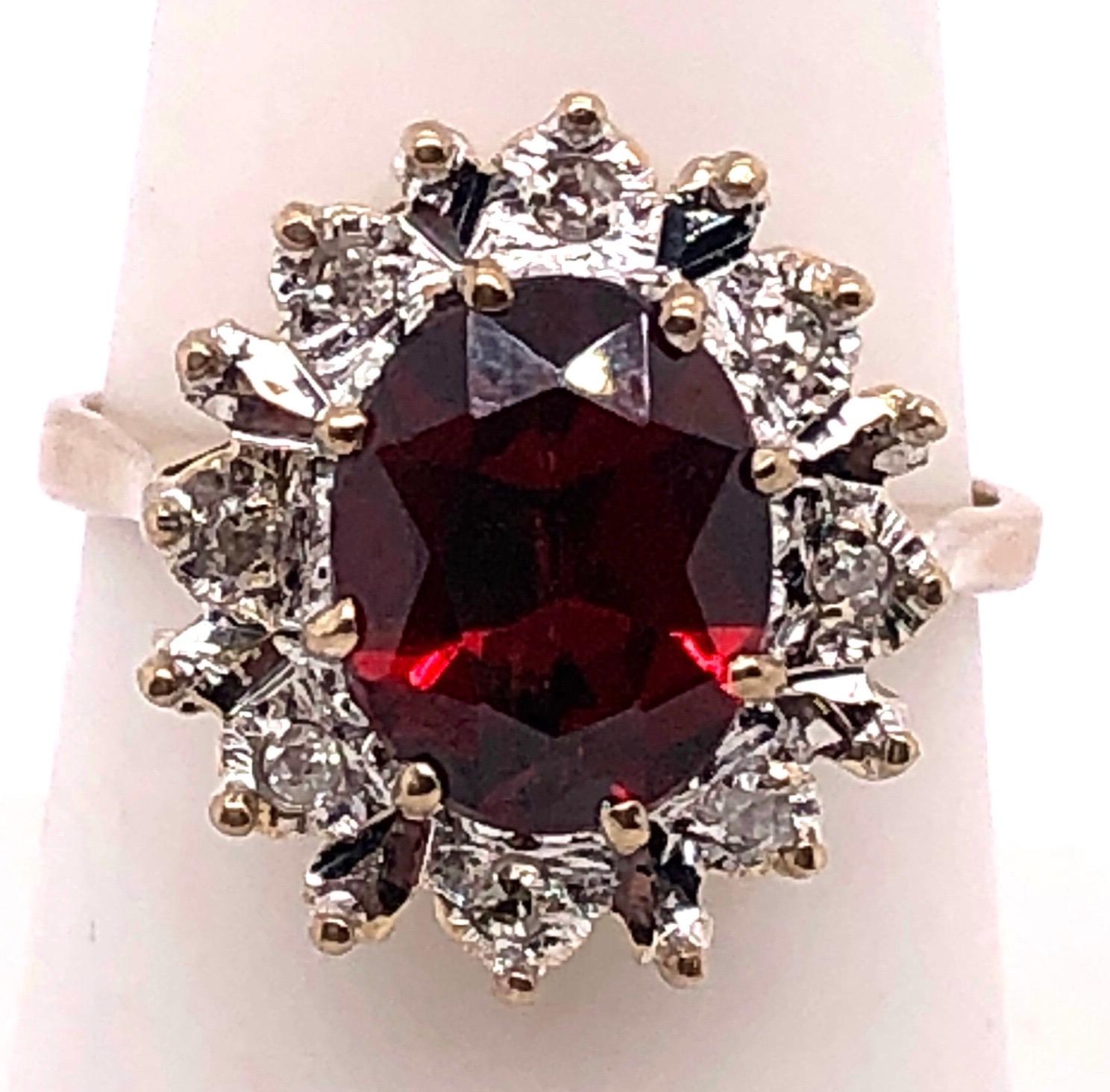 14 Karat Yellow Gold Fashion Ring with Ruby and Diamonds,
Size 7.25
3.9 grams total weight.