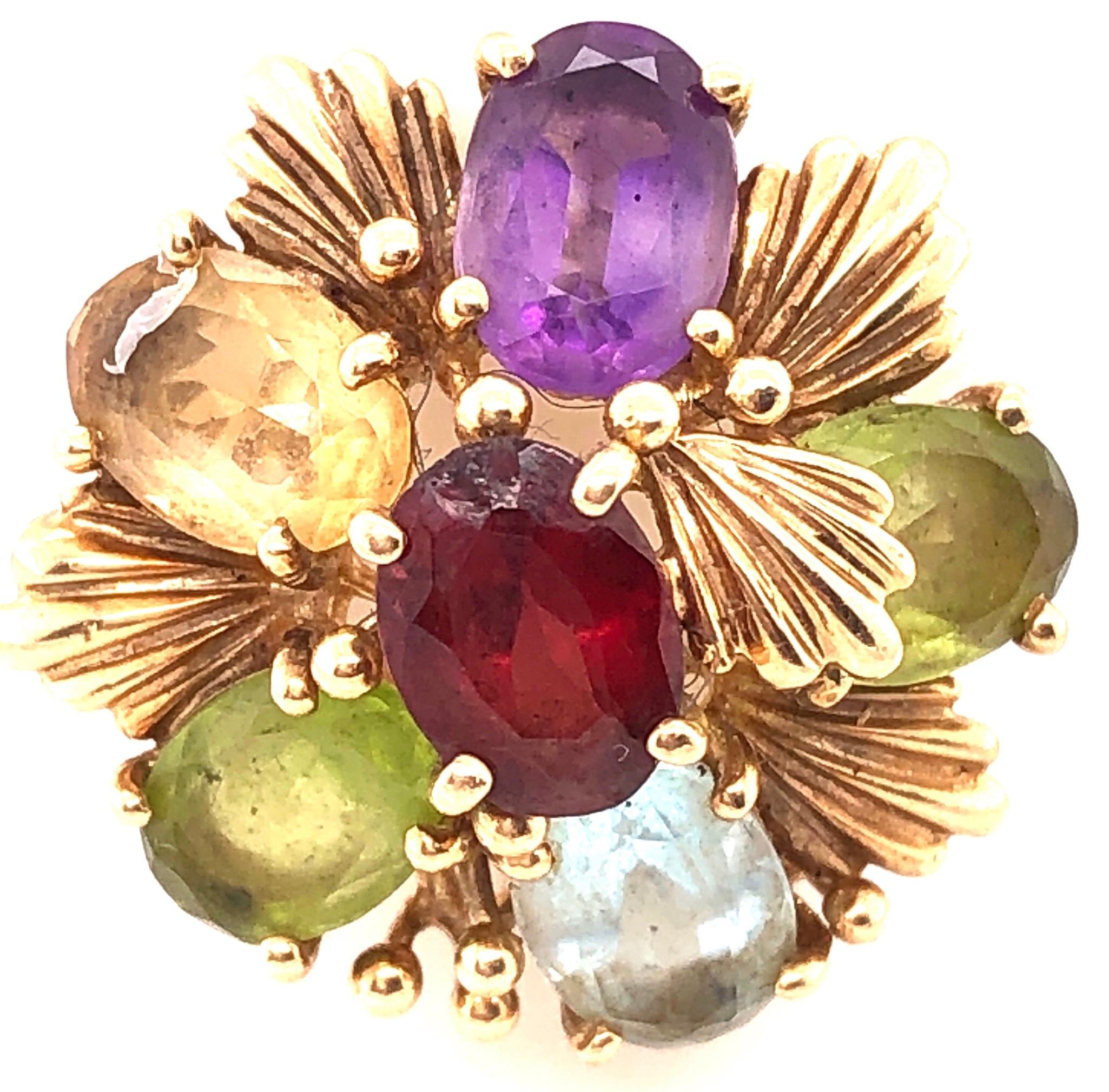 14 Karat Yellow Gold Fashion Ring with Semi Precious Stone Floral Cluster
Size 7 
5 grams total weight. 