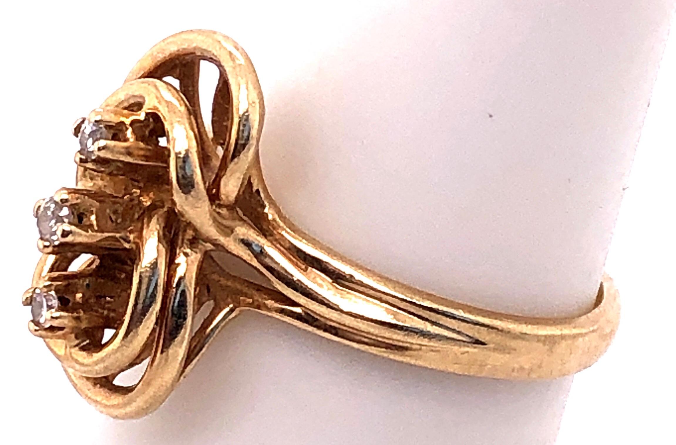 Round Cut 14 Karat Yellow Gold Fashion Ring with Three Round Diamonds For Sale