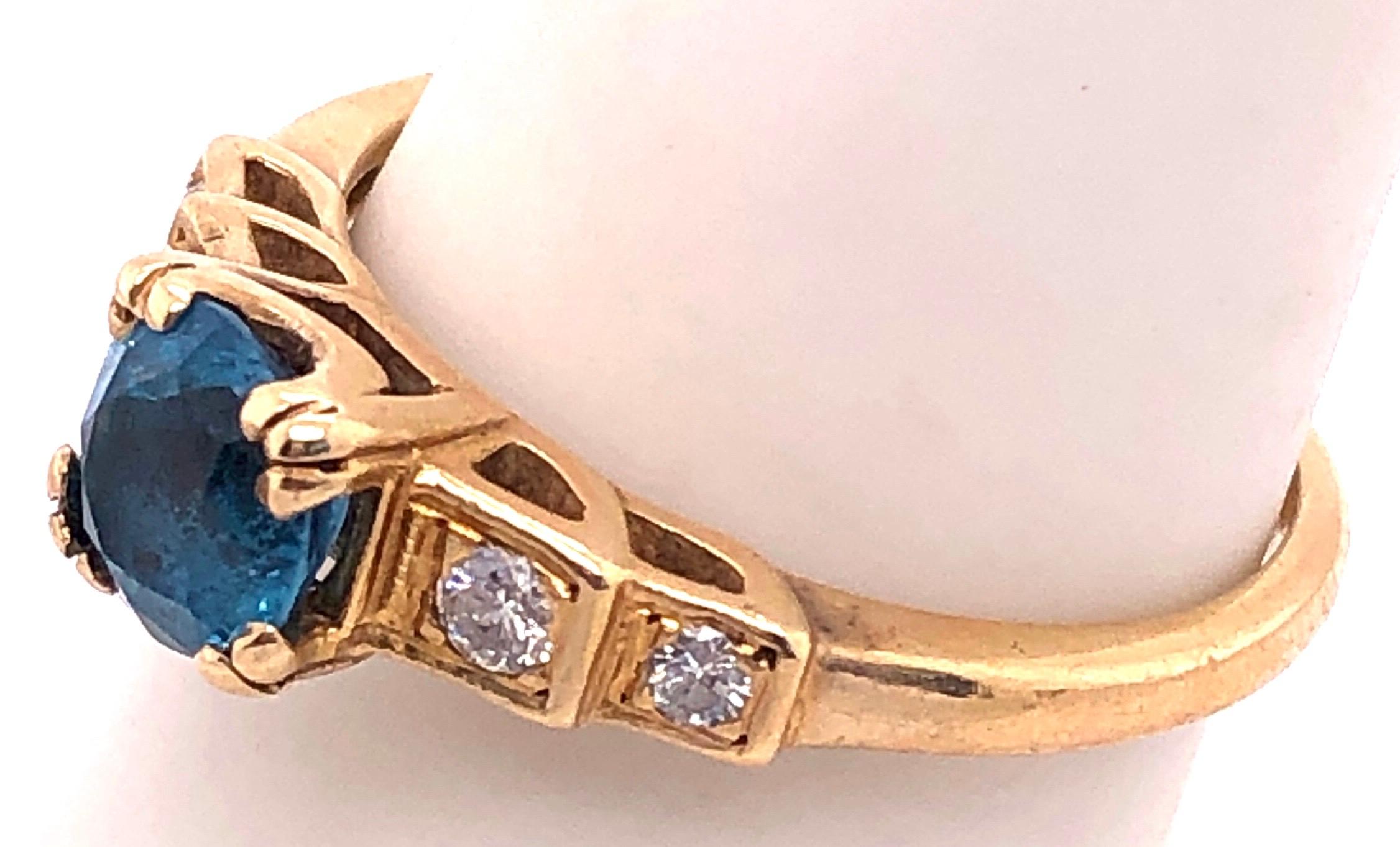 14 Karat Yellow Gold Fashion Round Blue Topaz with Diamond Accents Ring For Sale 1