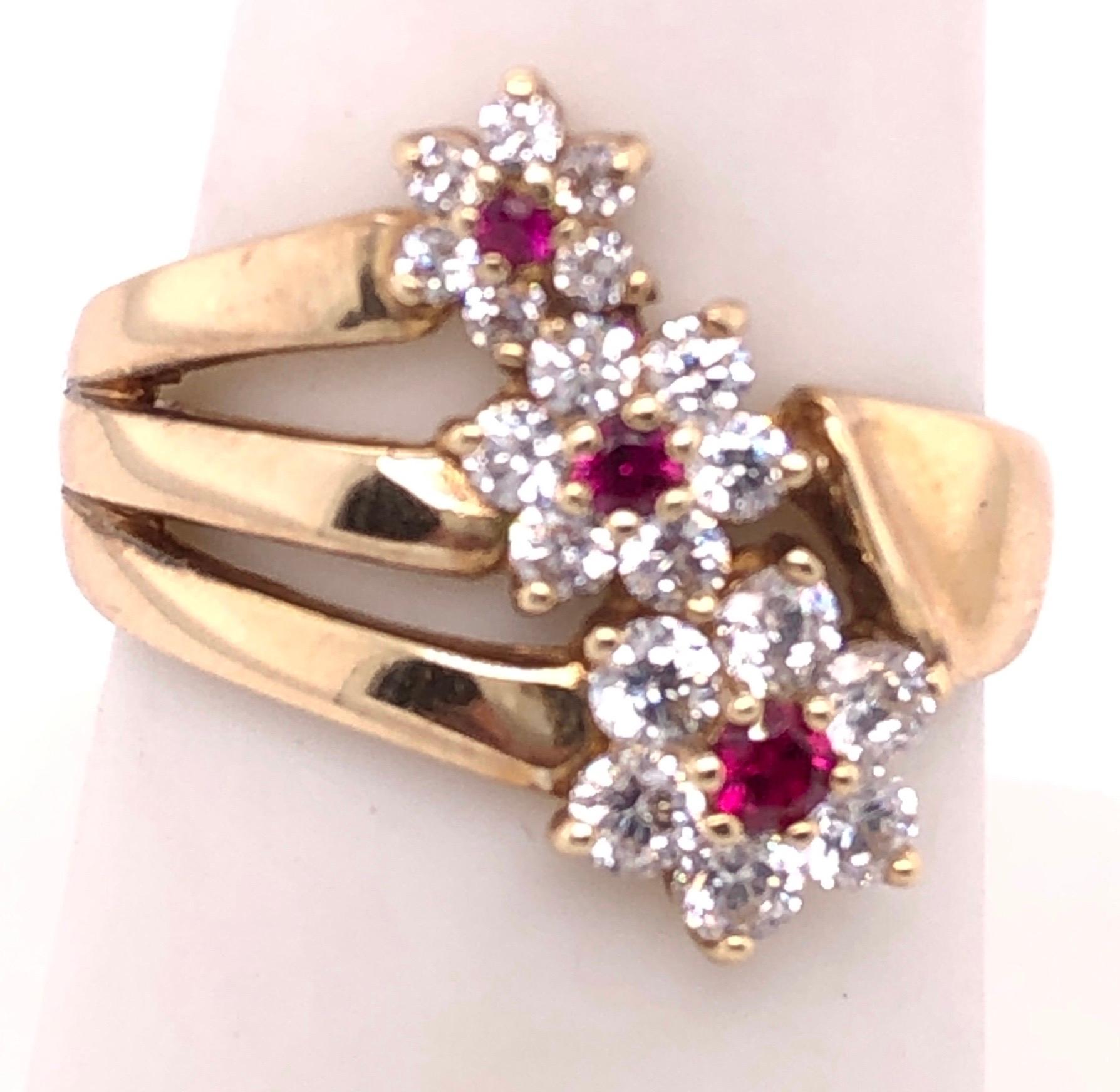 14 Karat Yellow Gold Fashion Three Flower Ring with Semi Precious Stones
Size 7.25
4.76 grams total weight.