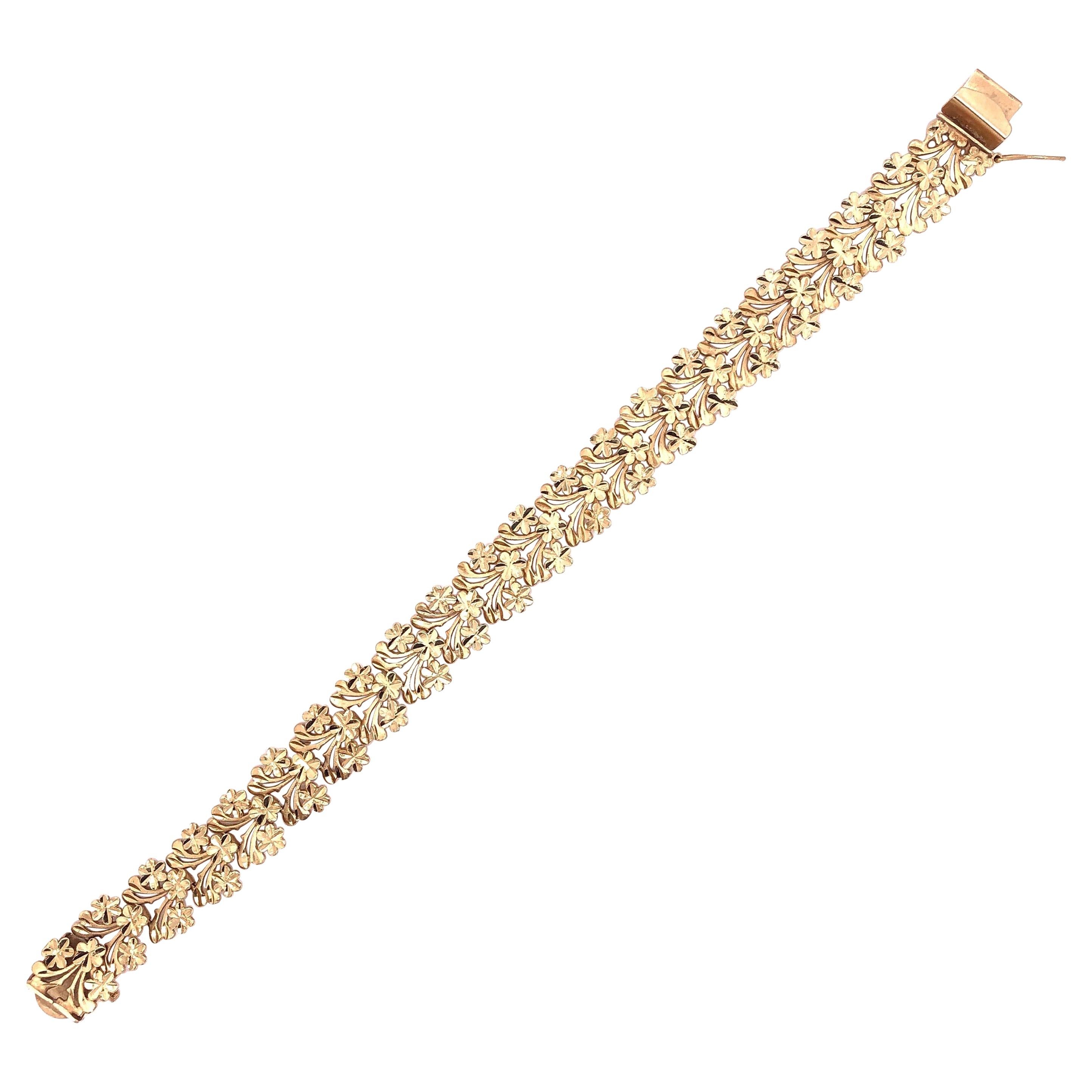 14 Karat Yellow Gold Fashion Scroll and Rose Bracelet For Sale