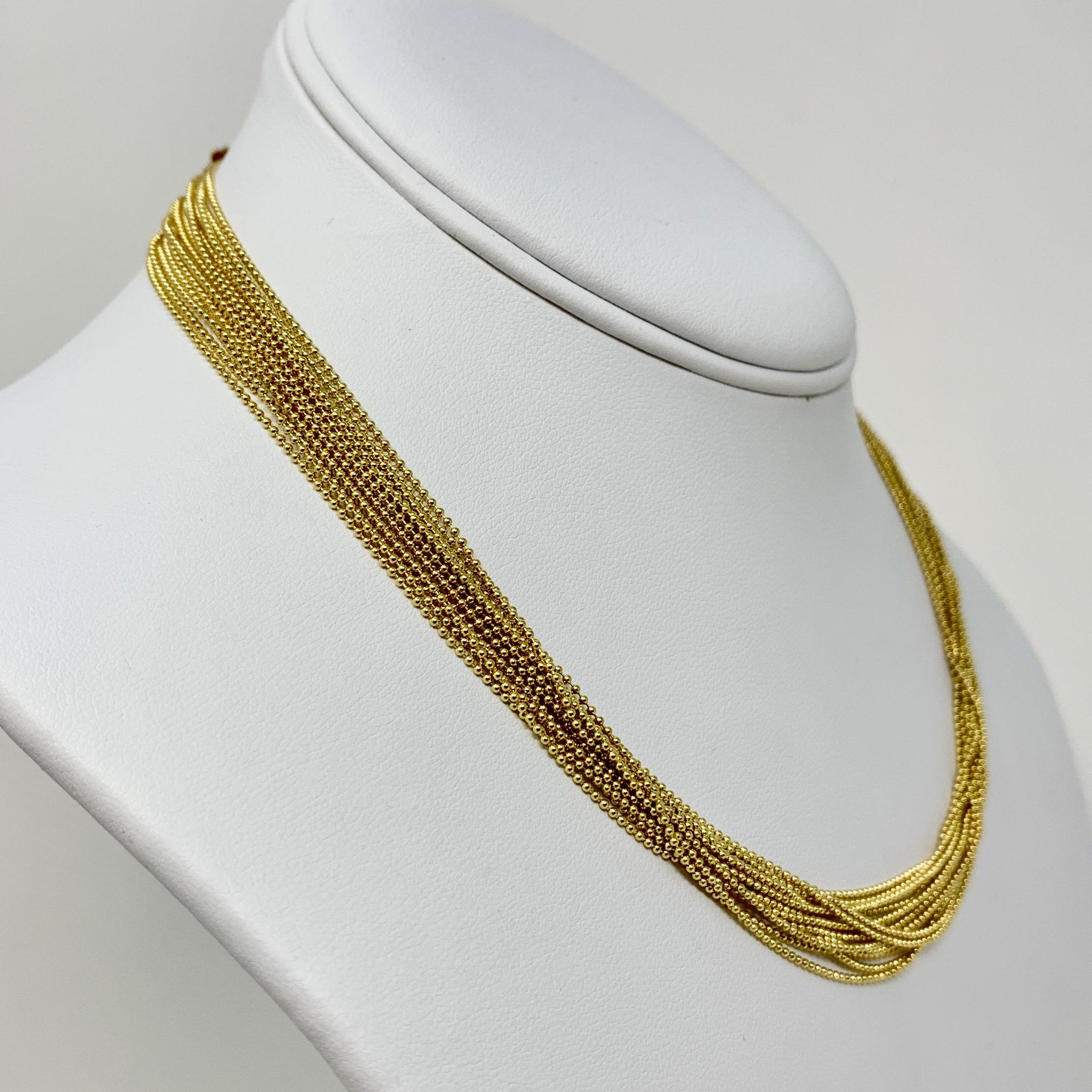 14k Yellow Gold Fifteen Strand Bead Link Chain Necklace 16.25 Inches

Condition:  Excellent (Professionally Cleaned and Polished)
Metal:  14k Gold (Marked, and Professionally Tested)
Weight:  24.5g
Length:  16.25 Inches
Width:  14mm
Closure:  Hook