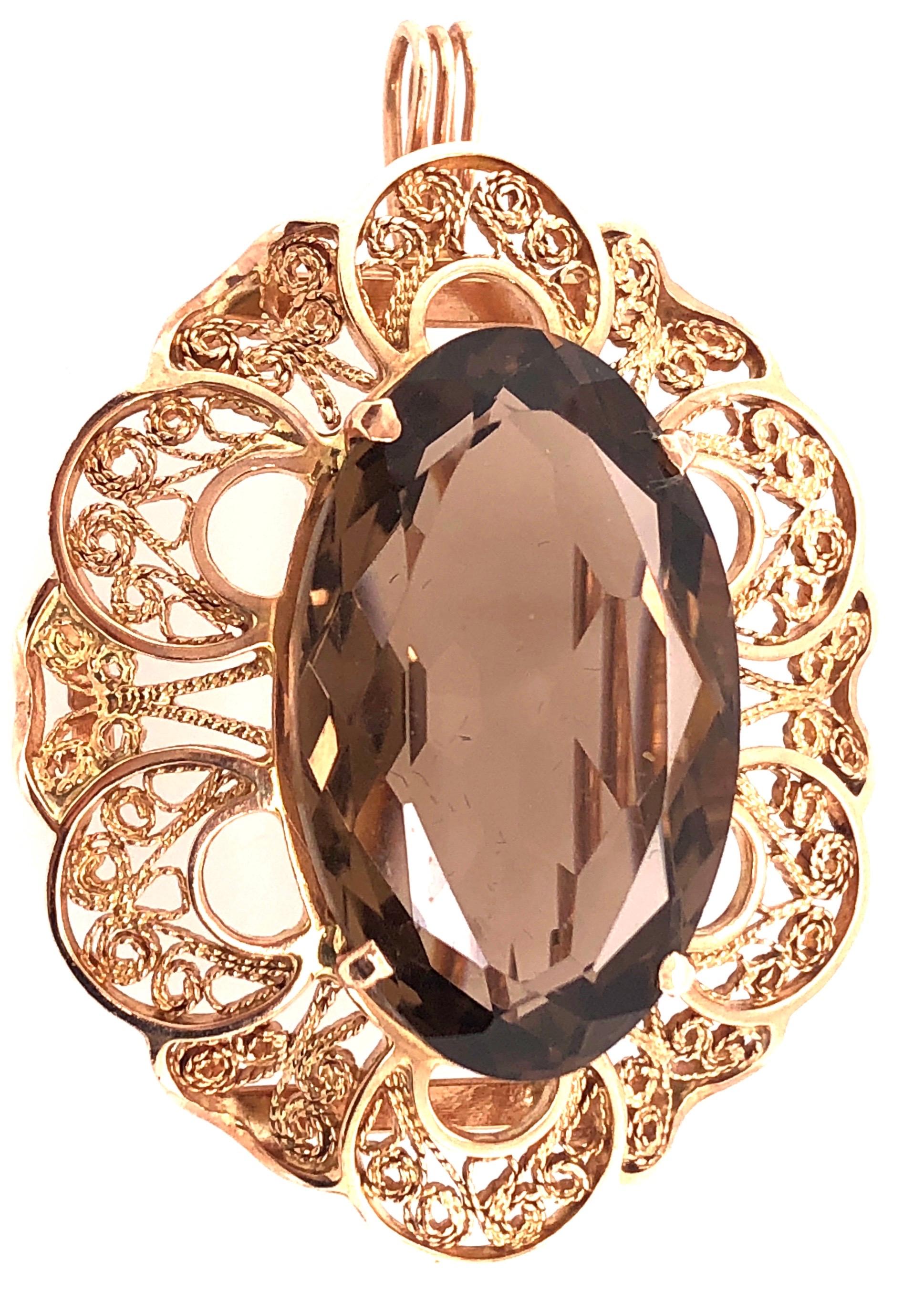 Women's or Men's 14 Karat Yellow Gold Filigree with Smokey Oval Topaz Brooch / Charm For Sale