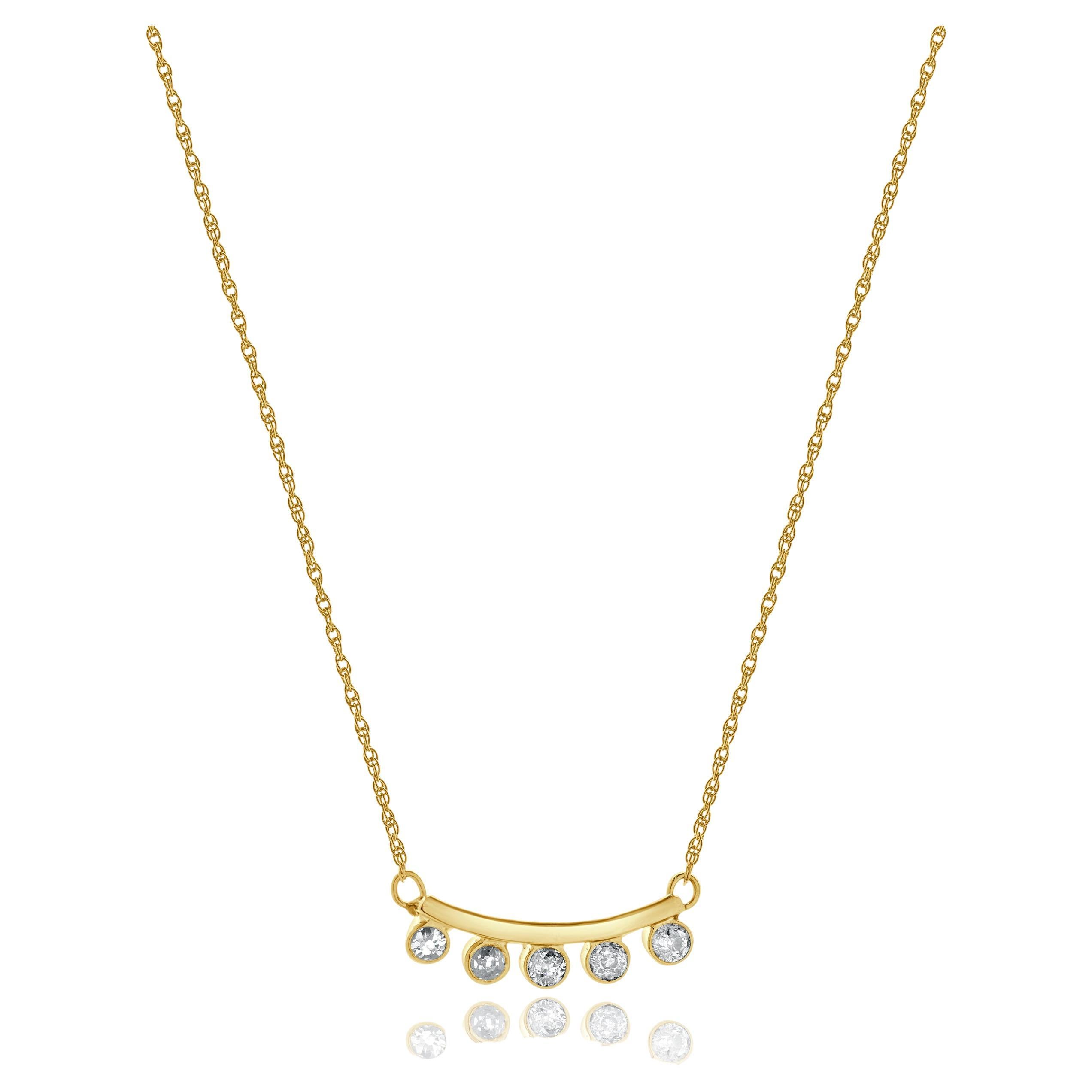 Collana con cinque diamanti incastonati in oro giallo 14 carati in vendita