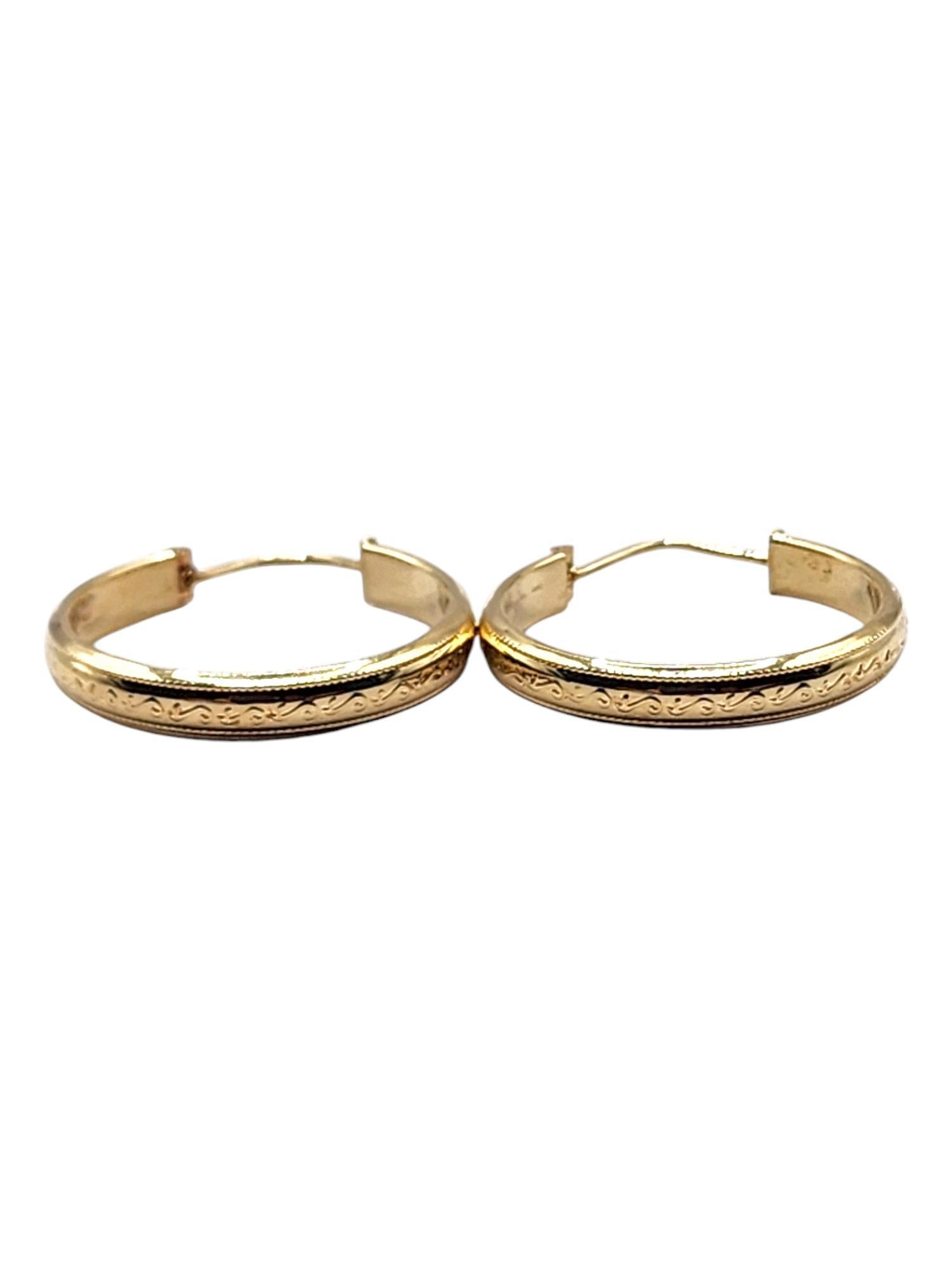 14 Karat Yellow Gold Flat Circle Hoop Earrings

These stunning circle hoop earrings were crafted from 14K yellow gold with gorgeous detailing along the outside that will look gorgeous on everyone!

Size: 28.33mm X 26.4mm X 1.81mm

Weight: 4.72 g/