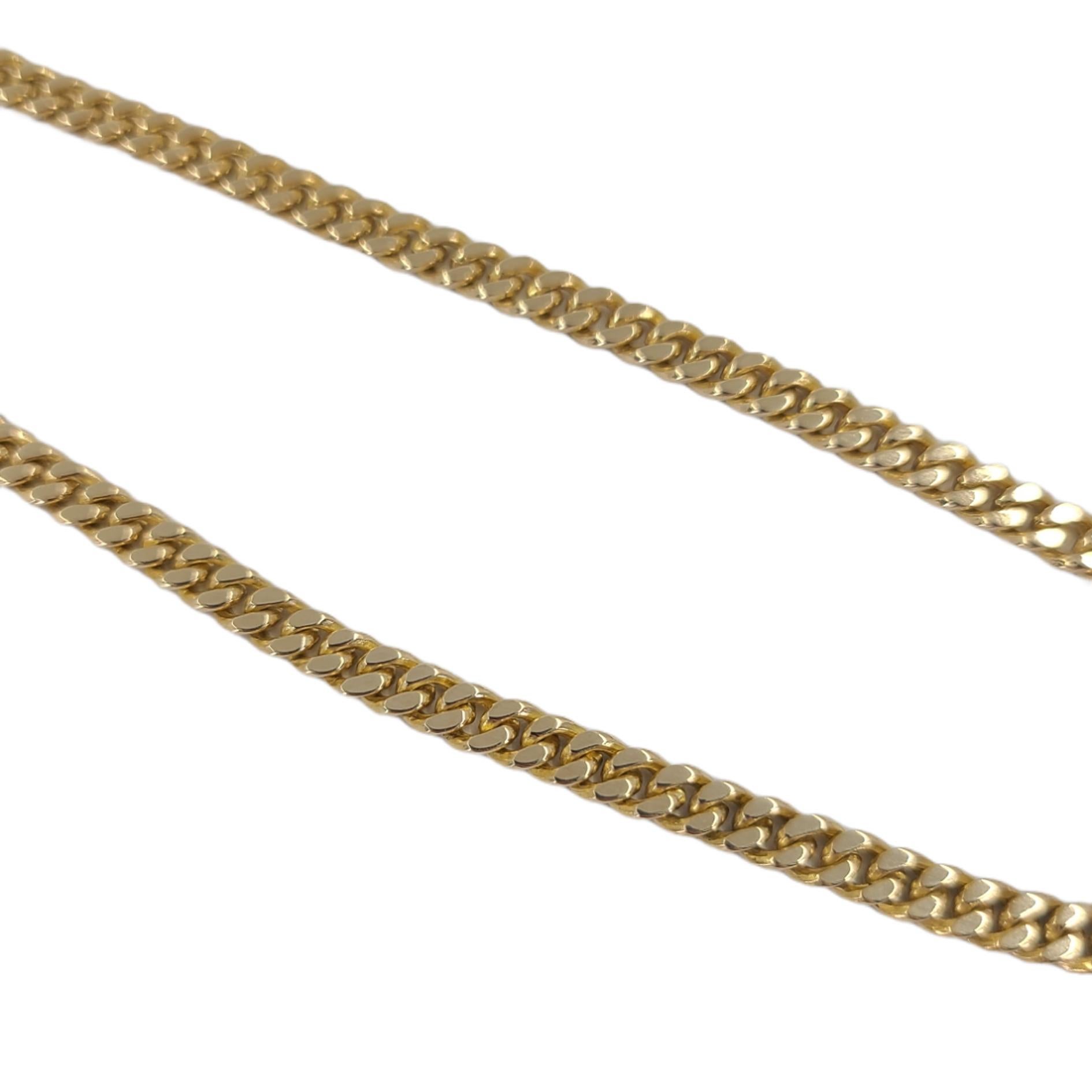 14 Karat Yellow Gold Flat Curb Link Chain Necklace Measuring 19 Inches Long With Lobster Clasp Closure. Finished Weight Is 27.2 Grams.