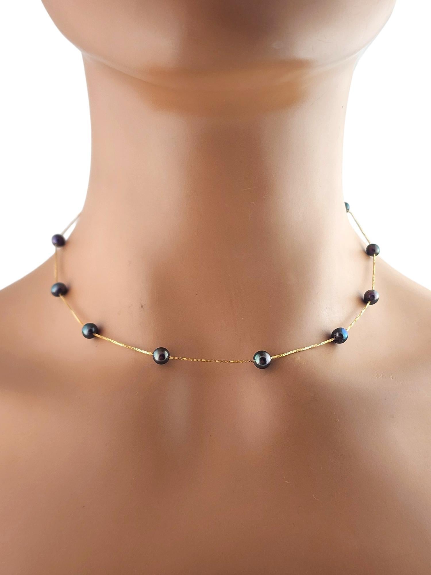 14 Karat Yellow Gold Floating Black Pearl Necklace #19332 For Sale 1