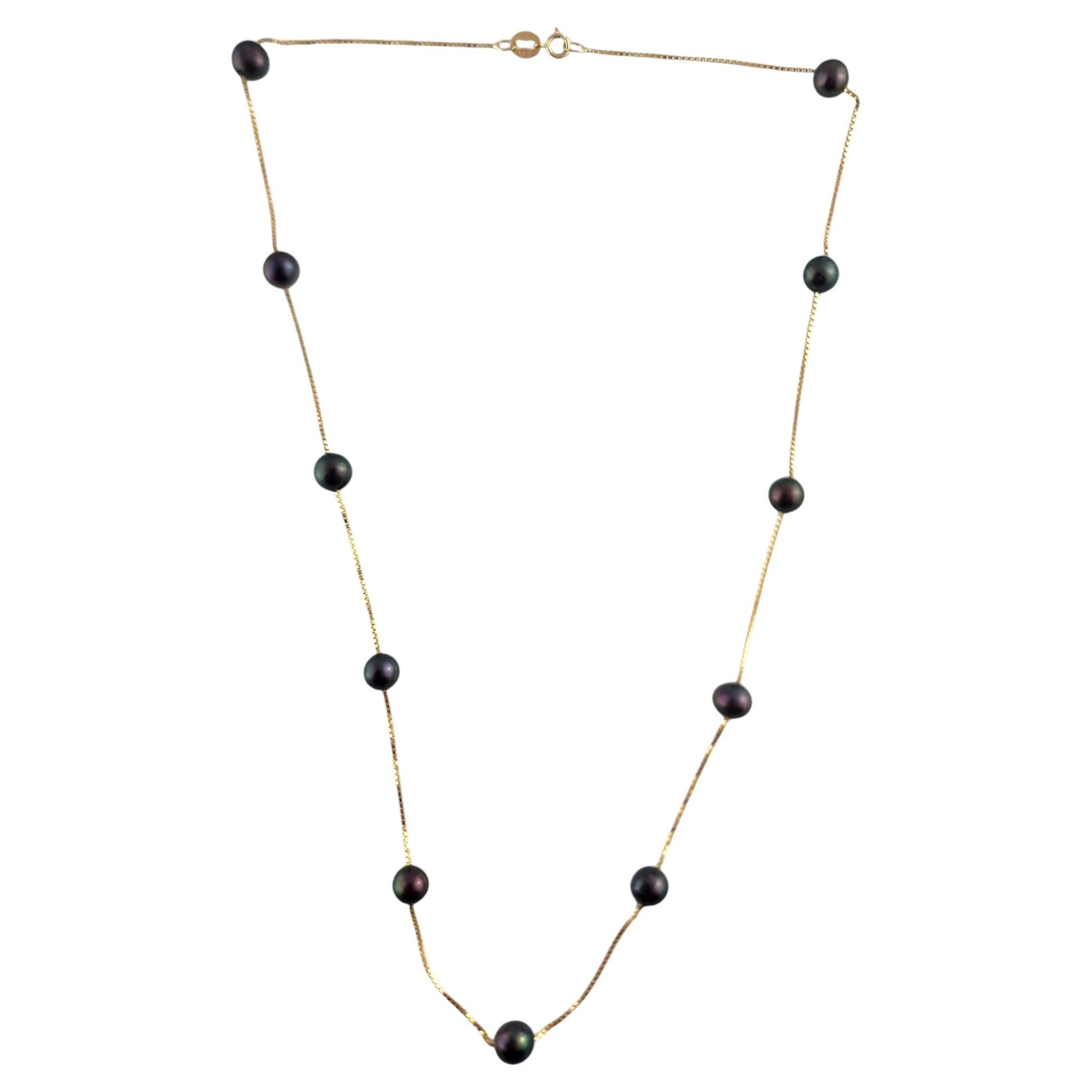 14 Karat Yellow Gold Floating Black Pearl Necklace #19332