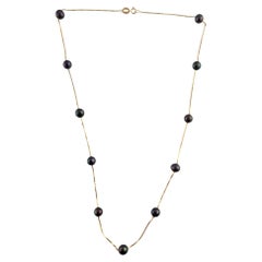 14 Karat Yellow Gold Floating Black Pearl Necklace #19332