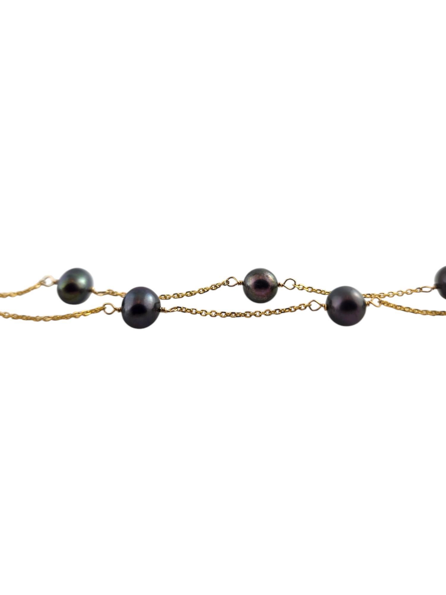 Collier de perles noires flottantes en or jaune 14 carats

Ce magnifique collier est composé de 11 perles noires sur une chaîne en or jaune 14 carats !

Longueur de la chaîne : 16 1/2