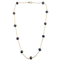14 Karat Yellow Gold Floating Black Pearl Necklace #19337