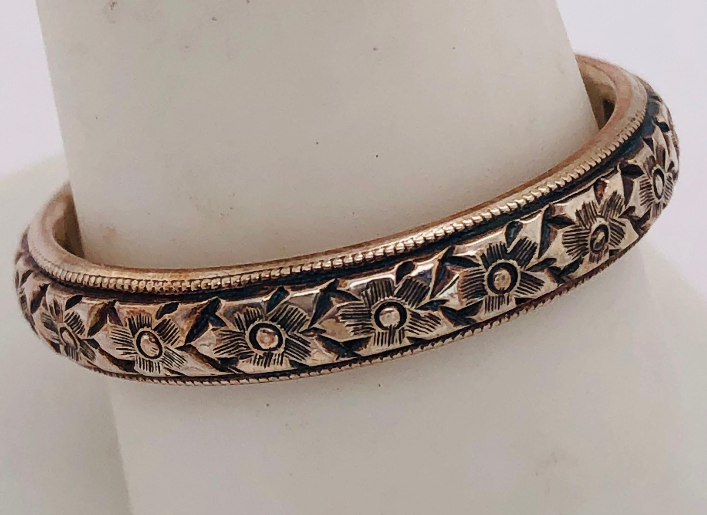 14 Karat Gelbgold Floral geätzte Band / Ehering
Größe 9,5 mit 6,30 Gramm Gesamtgewicht.

