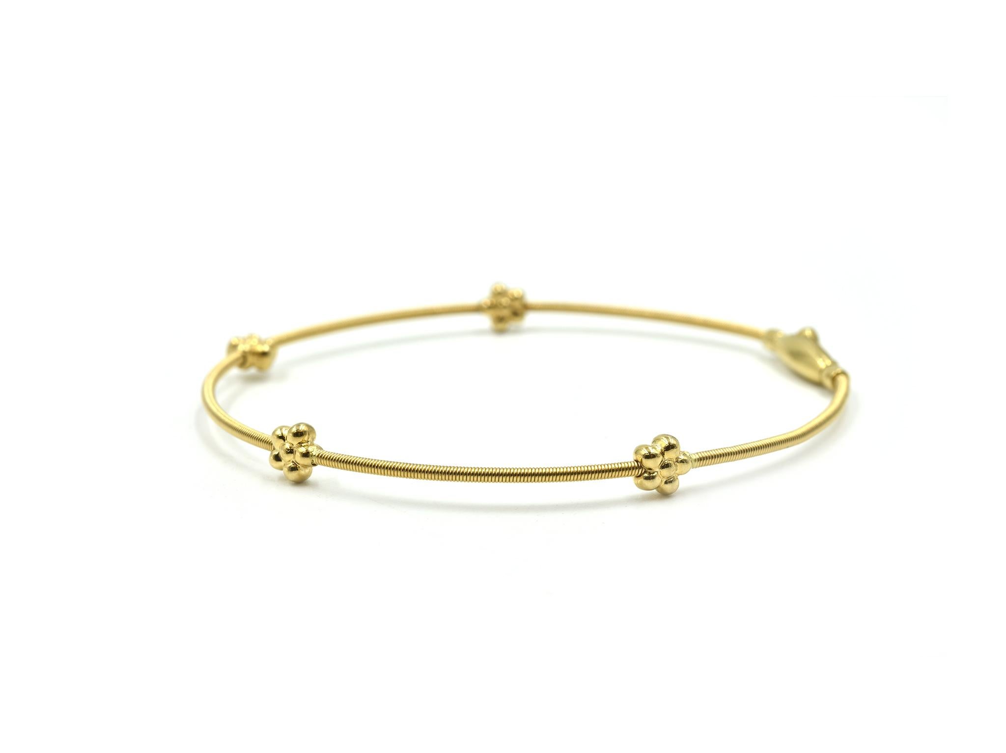 Designer: custom design
Material: 14k yellow gold
Dimensions: bracelet measures 8-inches long
Weight: 4.29 grams
