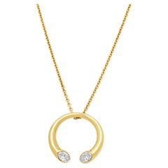 14 Karat Yellow Gold Flush Set Oval Cut Diamond Wishbone Style Necklace