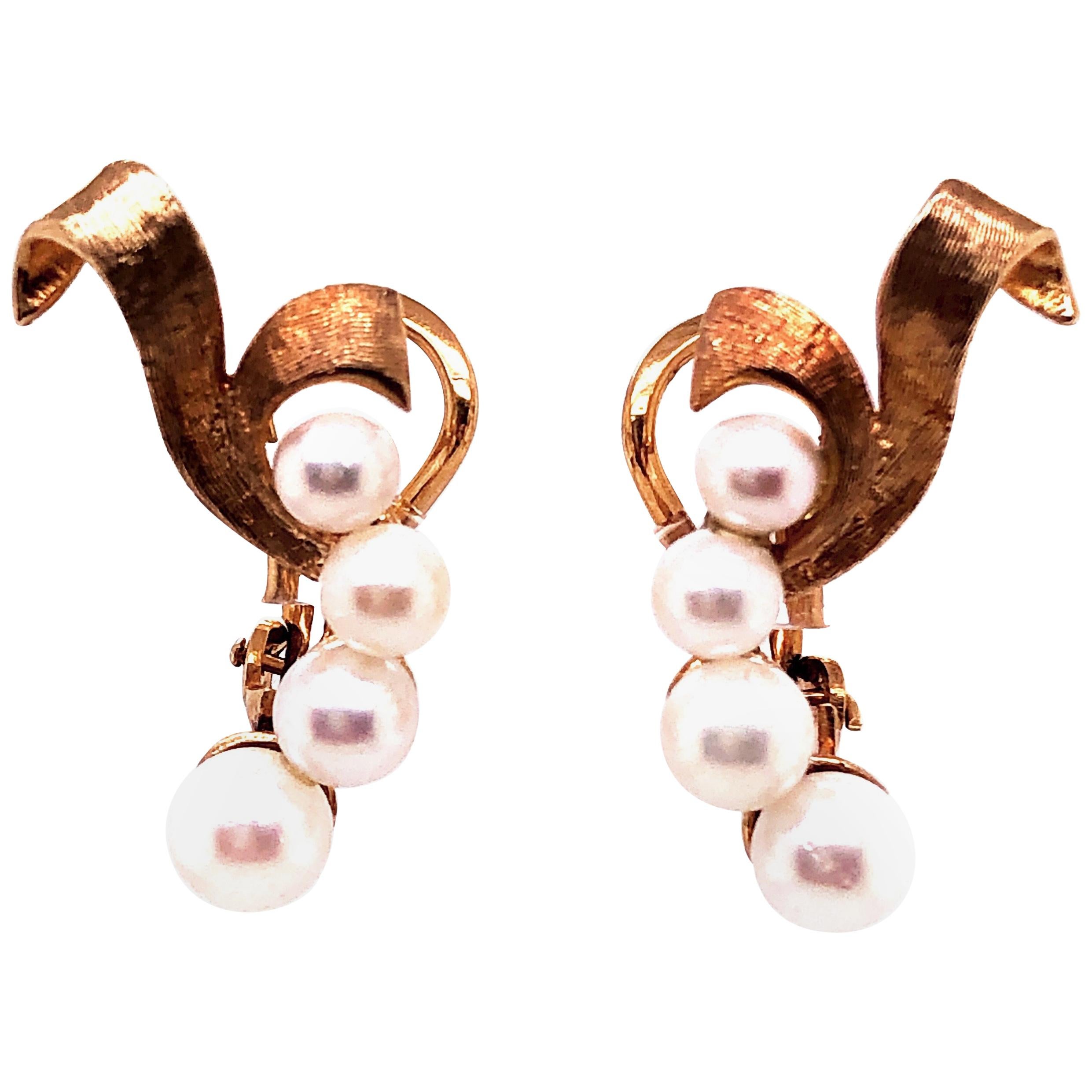14 Karat Yellow Gold Four Pearl Drop Earrings with English Locks For Sale