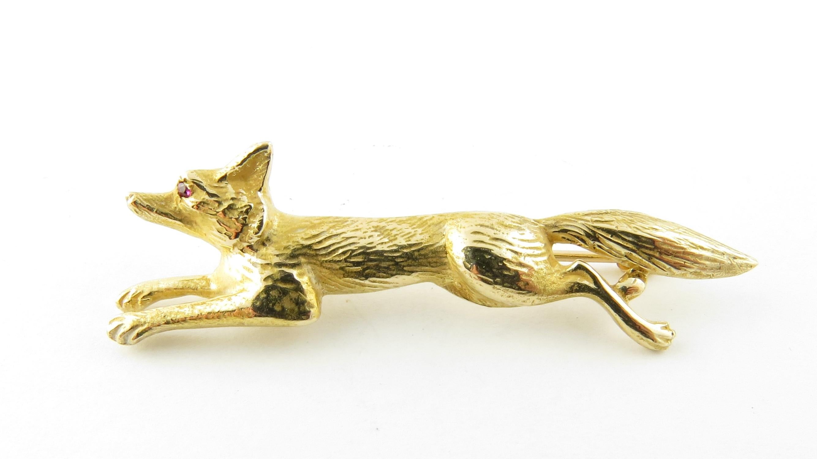 Vintage 14 Karat Yellow Gold Fox Brooch / Pin

This elegant pin features a fox in motion meticulously detailed in classic 14K yellow gold and one genuine ruby eye.

Size: 43 mm x 14 mm

Weight: 4.0 dwt. / 6.3 gr.

Stamped: 14K

Very good condition,