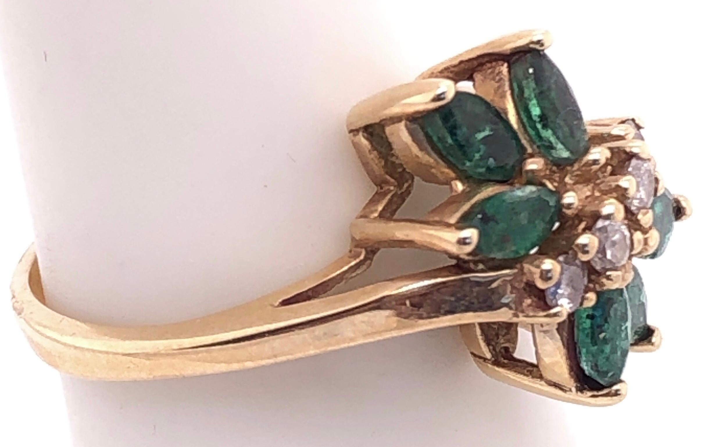14 Karat Yellow Gold Free Form Emerald With Diamond Accents Ring Size 5.75.
0.04 total diamond weight.
6 piece oval emerald
3.48 grams total weight.