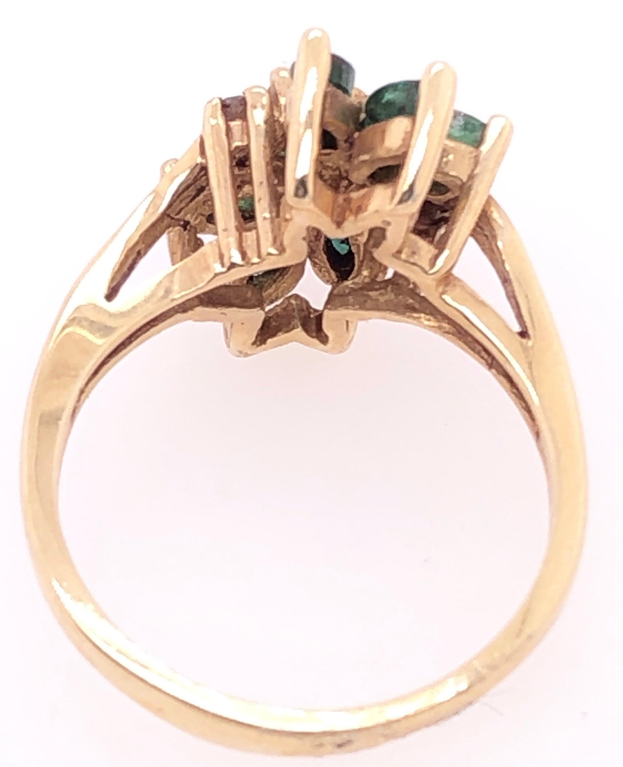 14 Karat Yellow Gold Freeform Emerald with Diamond Accents Ring In Good Condition For Sale In Stamford, CT
