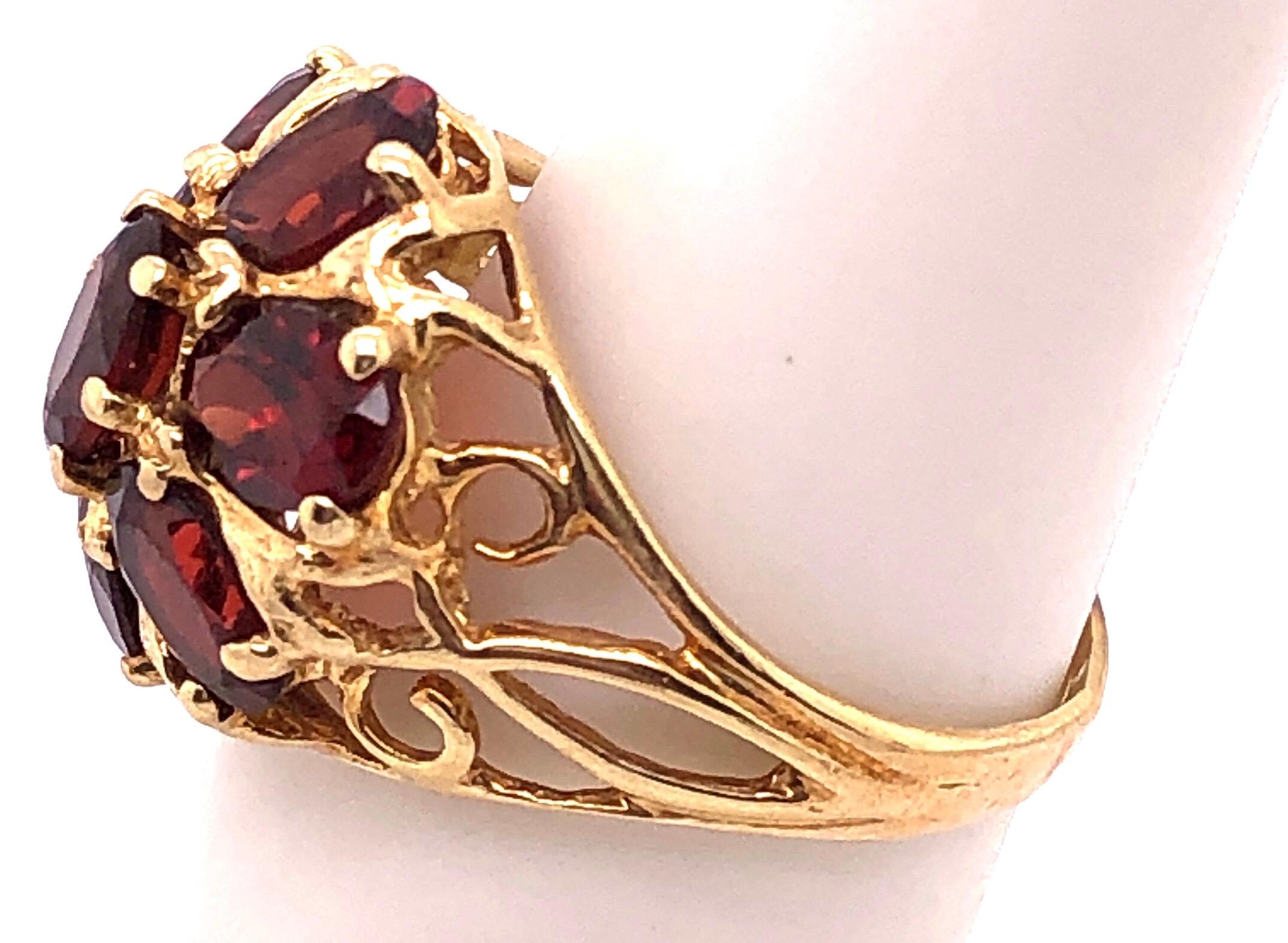 Women's or Men's 14 Karat Yellow Gold Freeform Garnet Flower Design Ring For Sale