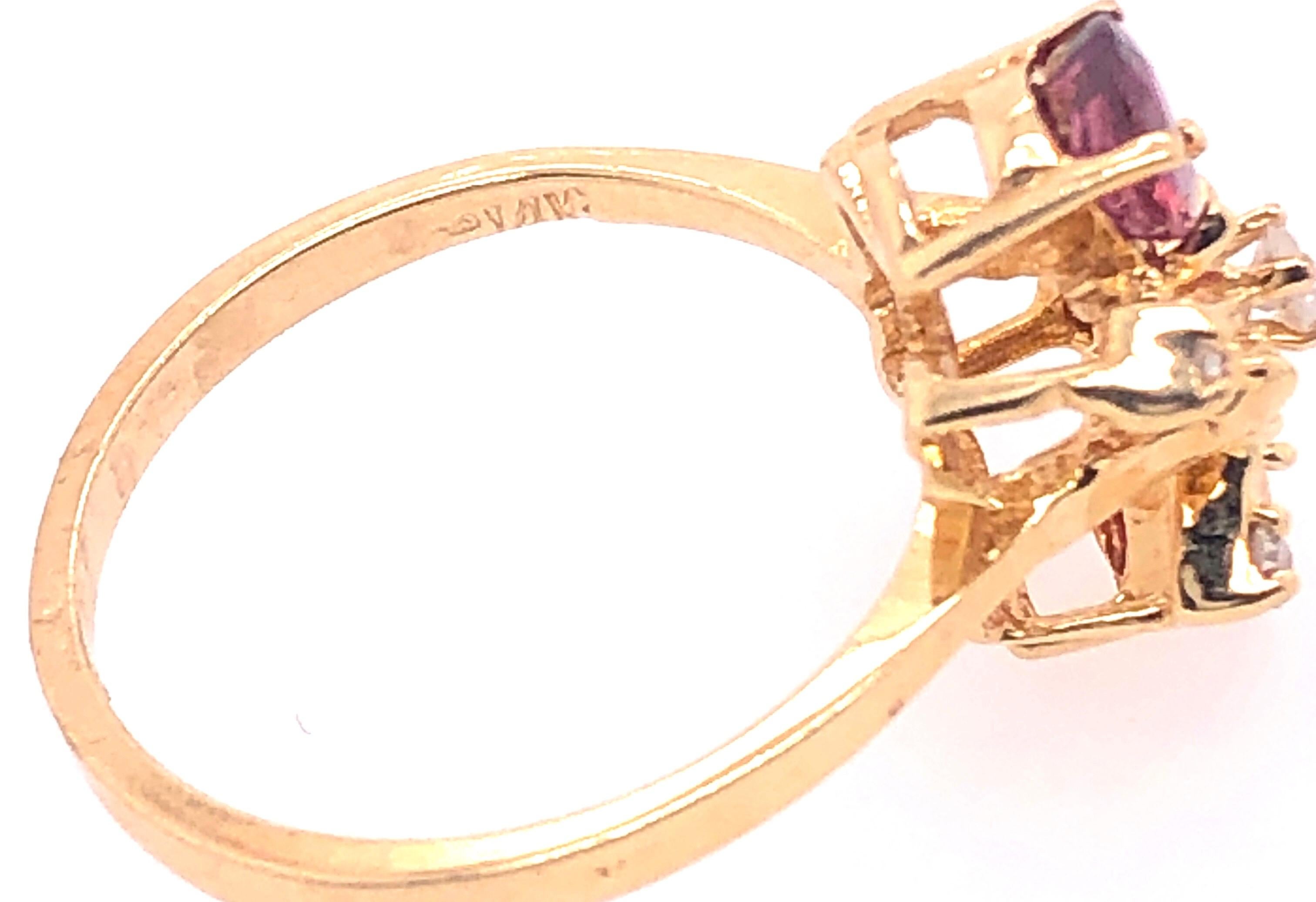 Modern 14 Karat Yellow Gold Freeform Ruby and Diamond Ring For Sale