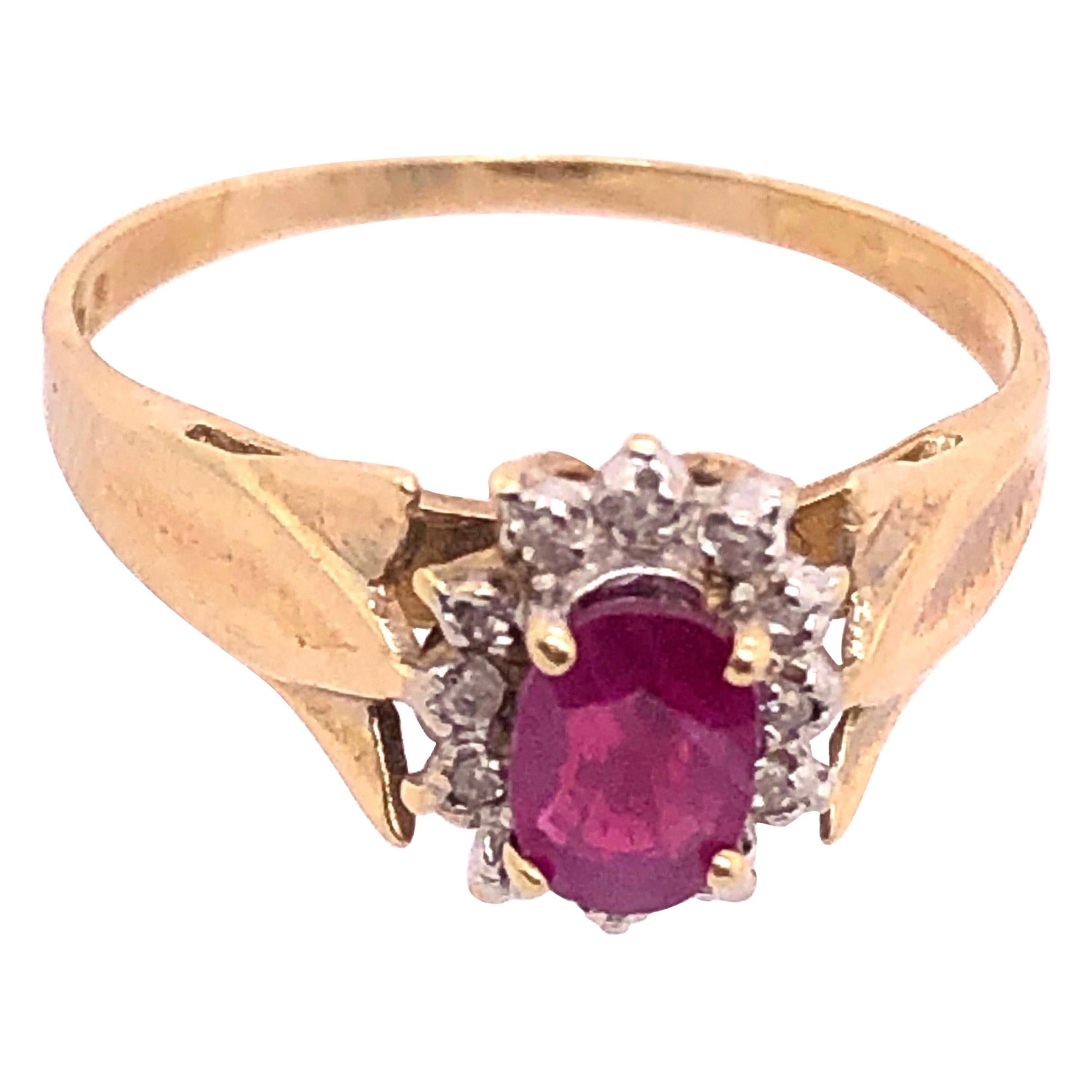 14 Karat Yellow Gold Free Form Ruby Center with Diamond Accents Ring For Sale