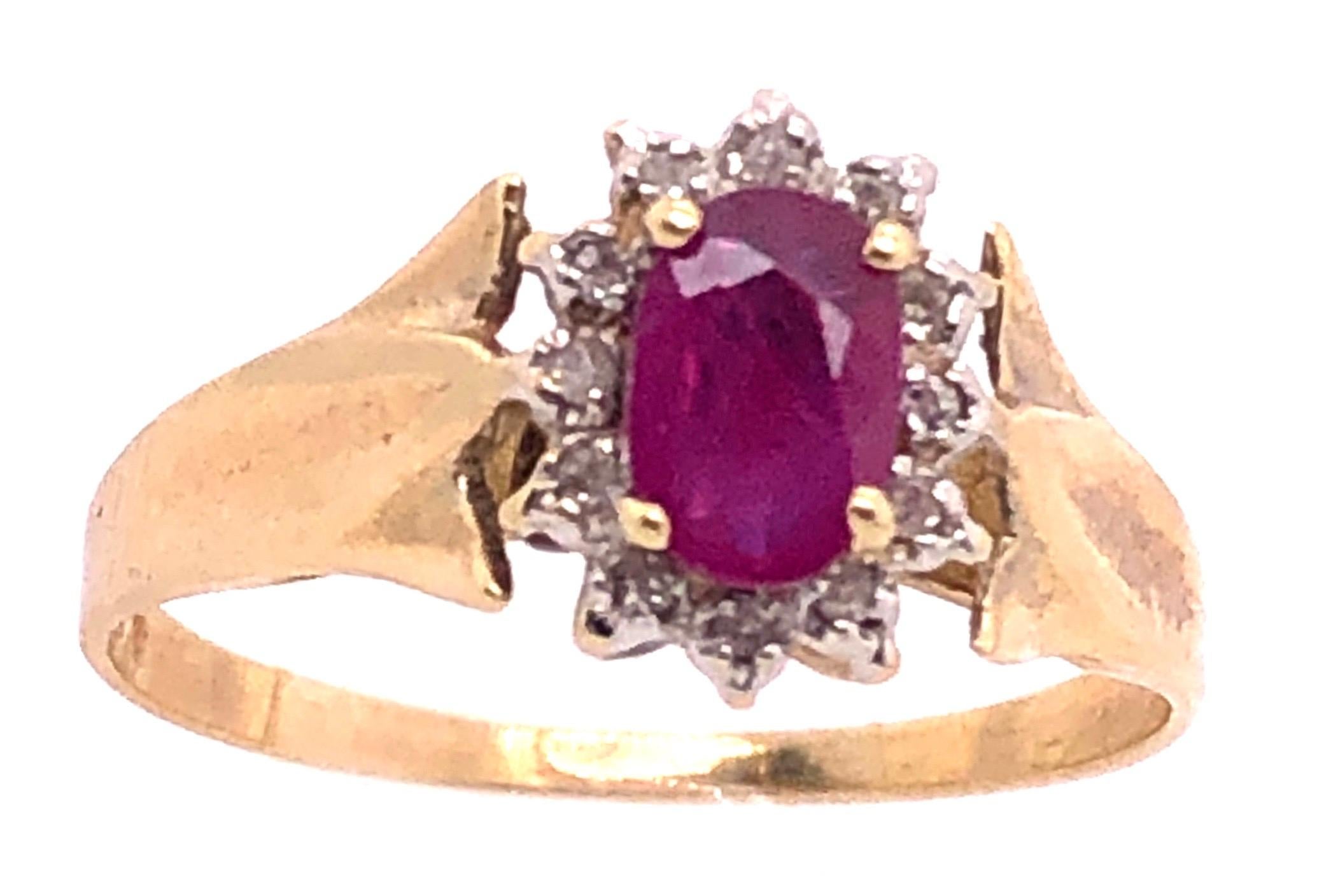 Oval Cut 14 Karat Yellow Gold Free Form Ruby Center with Diamond Accents Ring For Sale