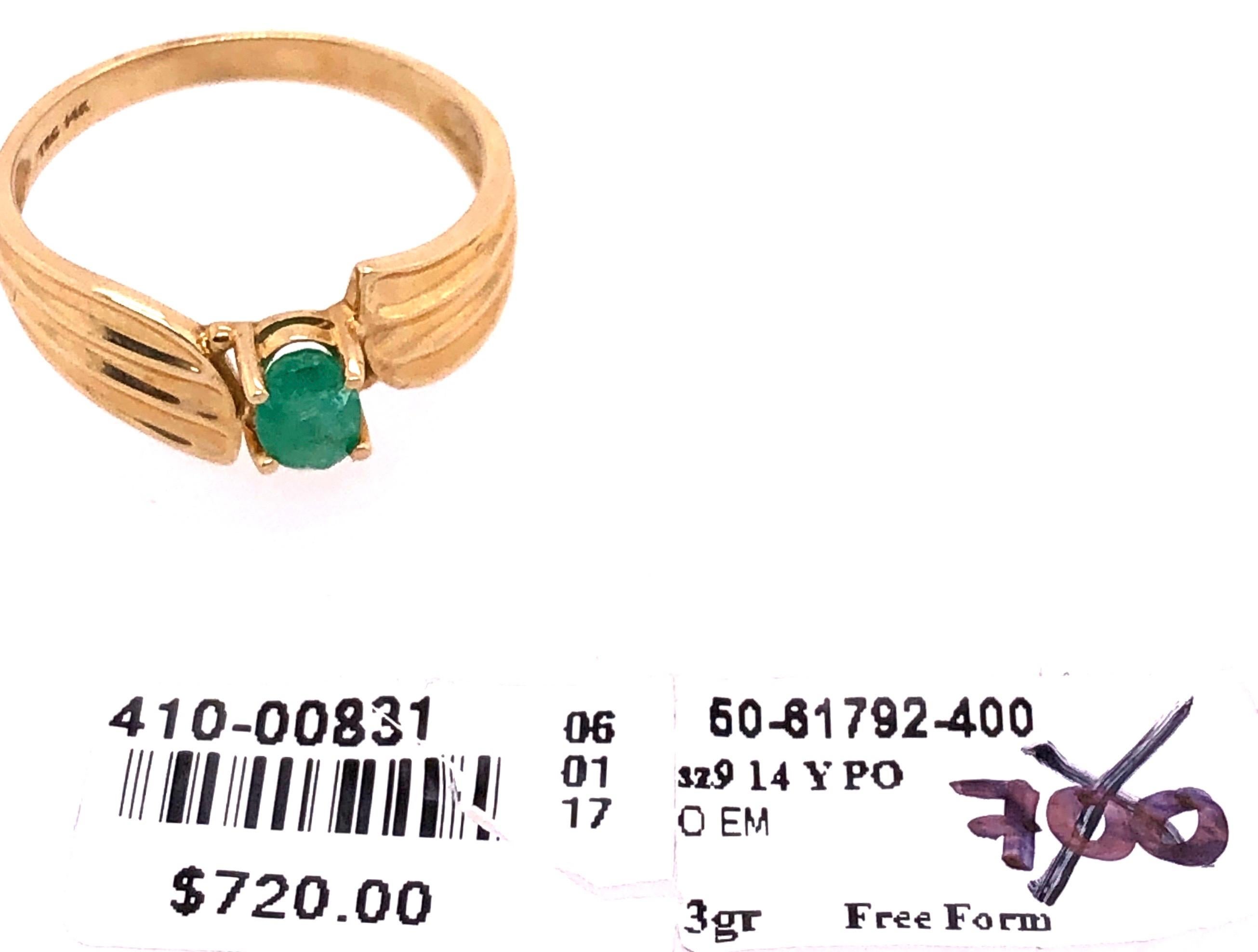 14 Karat Yellow Gold Freeform With Center Oval Emerald Ring For Sale 3