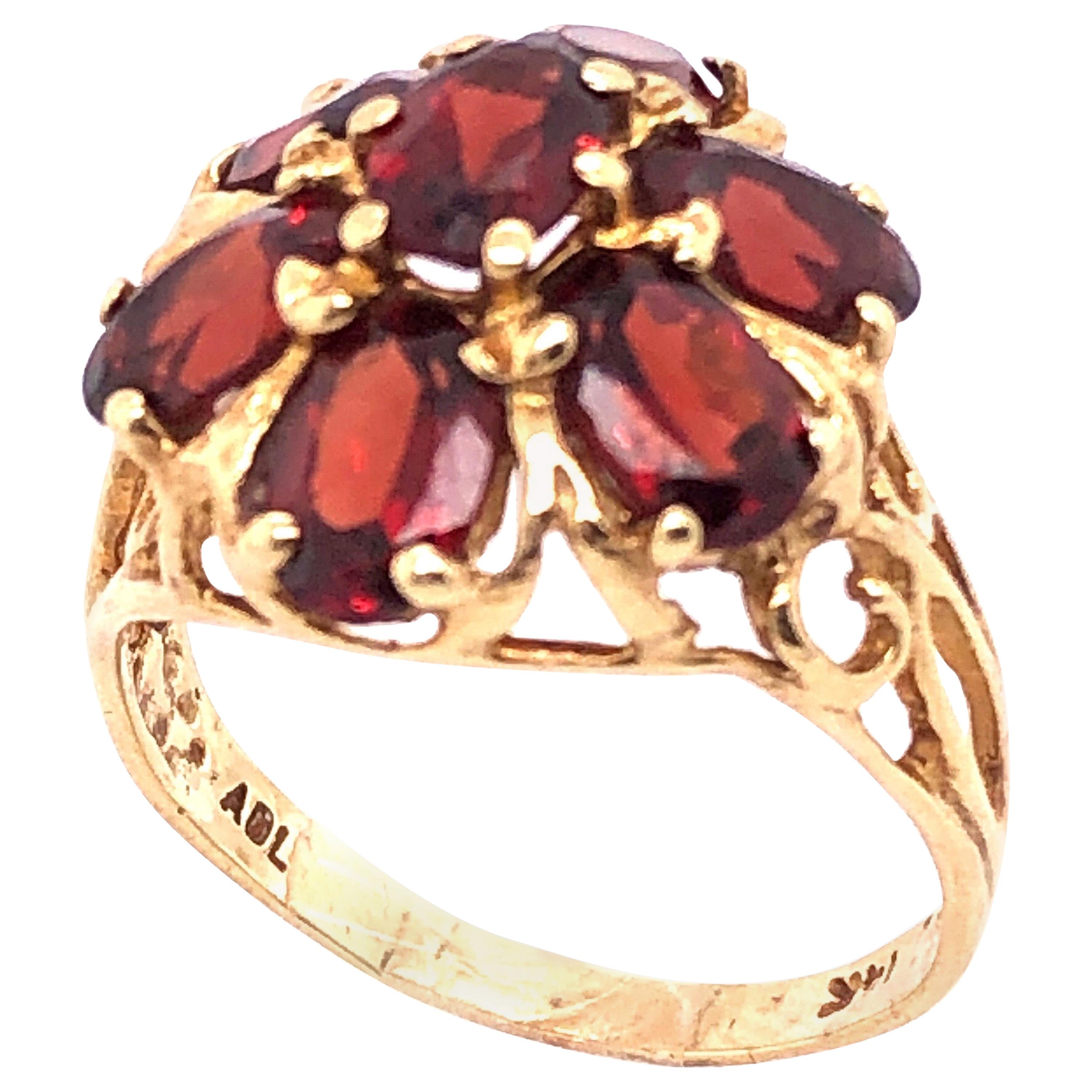 14 Karat Yellow Gold Freeform Garnet Flower Design Ring For Sale