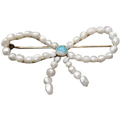 14 Karat Yellow Gold Fresh Water Pearl and Opal "Bow" Pin