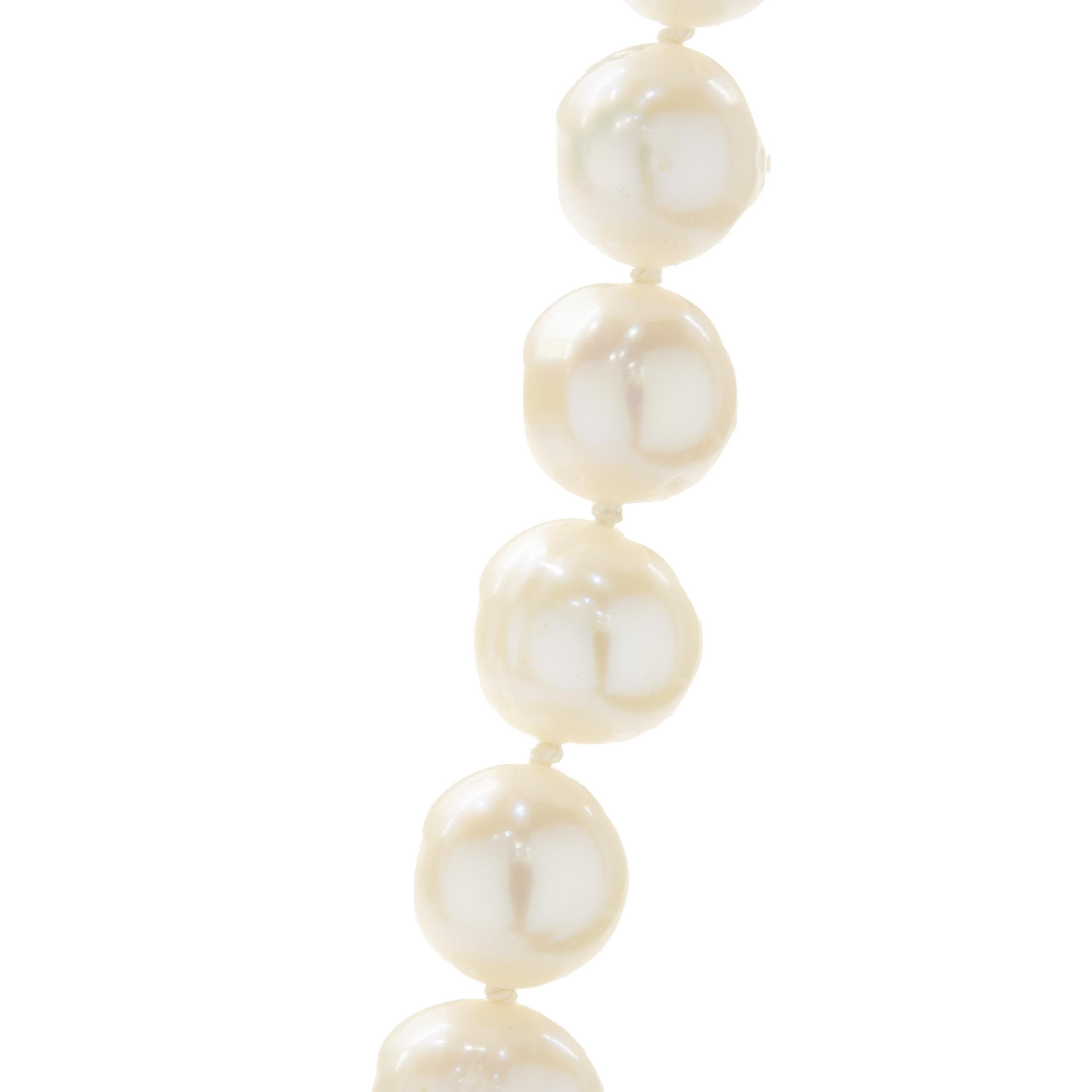 Designer: Custom
Material: 14K yellow gold / pearl
Dimensions: necklace measures 16-inches in length 
Weight: 38.52 grams