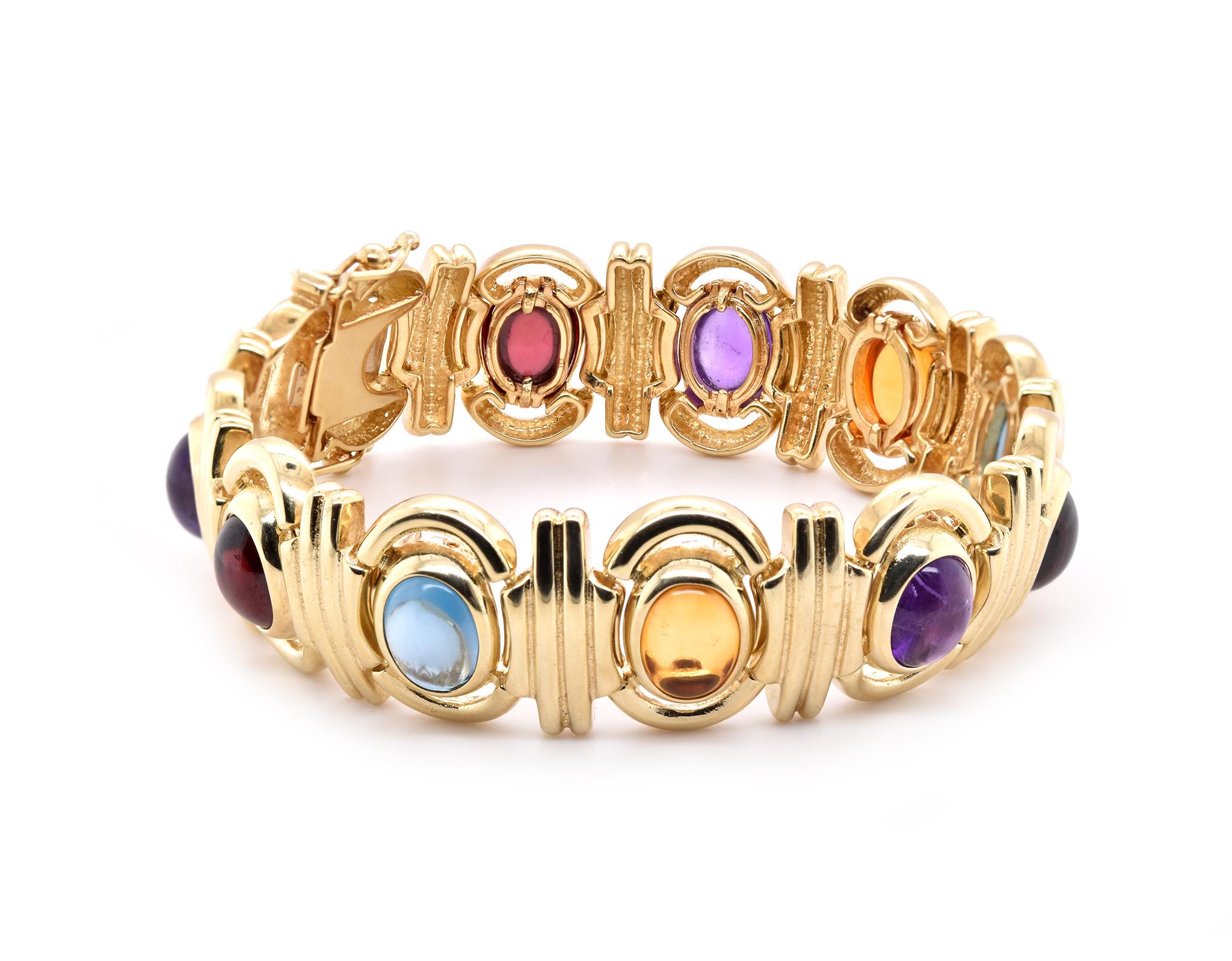 Material: 14K yellow gold 
Dimensions: bracelet will fit a 7-inch wrist, measures 16.5mm in width
Weight: 50.43 grams
