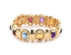 14 Karat Gold Garnet, Amethyst, Citrine, and Blue Topaz Cabochon Cut Bracelet