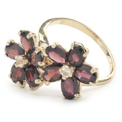 14 Karat Yellow Gold Garnet and Diamond Flower Ring