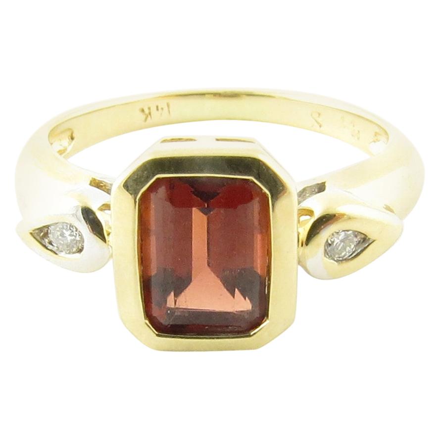 14 Karat Yellow Gold Garnet and Diamond Ring