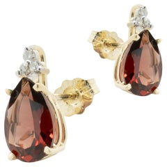 14 Karat Yellow Gold Garnet and Diamond Stud Earrings