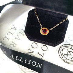 14 Karat Yellow Gold Garnet and Orange Sapphire Halo Necklace