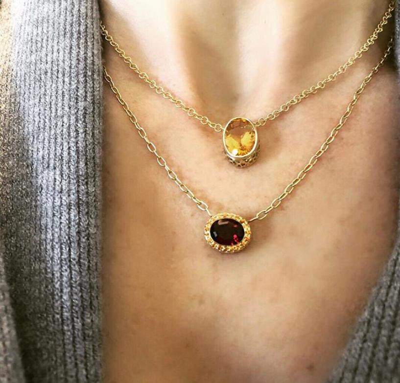 Oval Cut 14 Karat Yellow Gold Garnet and Orange Sapphire Halo Necklace For Sale