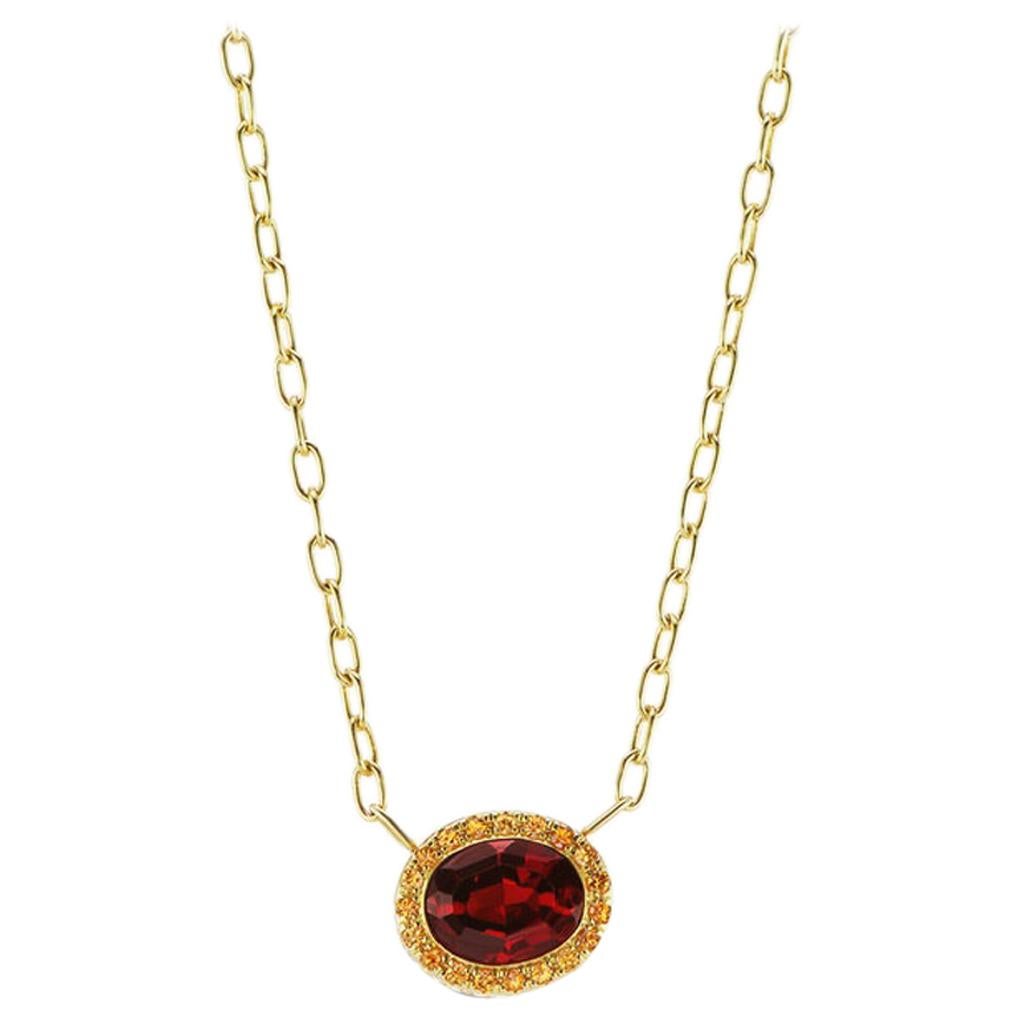 14 Karat Yellow Gold Garnet and Orange Sapphire Halo Necklace For Sale