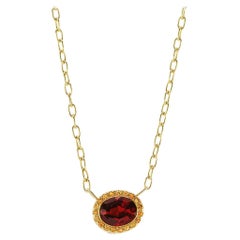 14 Karat Yellow Gold Garnet and Orange Sapphire Halo Necklace
