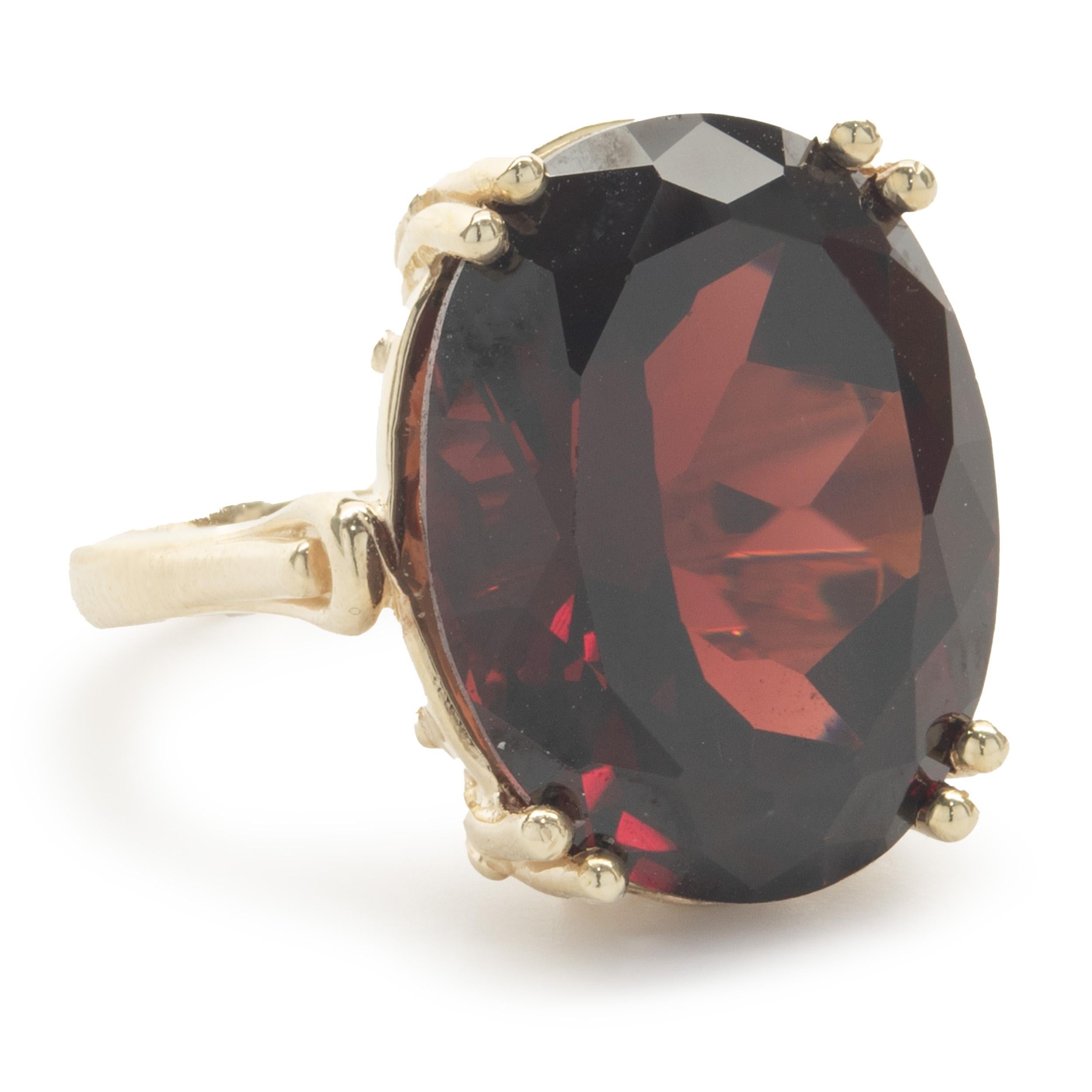 Designer: custom
Material: 14K yellow gold
Garnet: 1 oval cut = 22.35ct
Dimensions: ring top measures 19.25mm wide
Ring Size: 6.5 (complimentary sizing available)
Weight: 12.31 grams