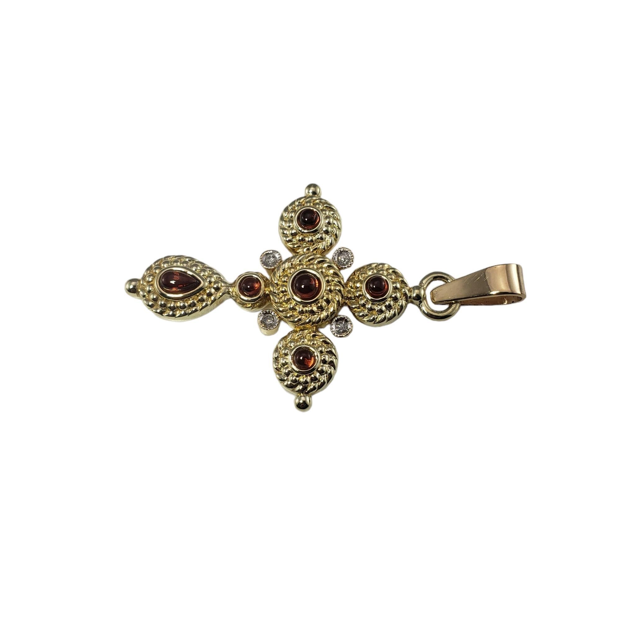 Pendentif vintage en or jaune 14 carats avec croix en citrine et diamant.

Cet élégant pendentif en forme de croix est orné de cinq pierres précieuses cabochon de couleur brun rougeâtre et de quatre diamants ronds de taille brillant, le tout serti