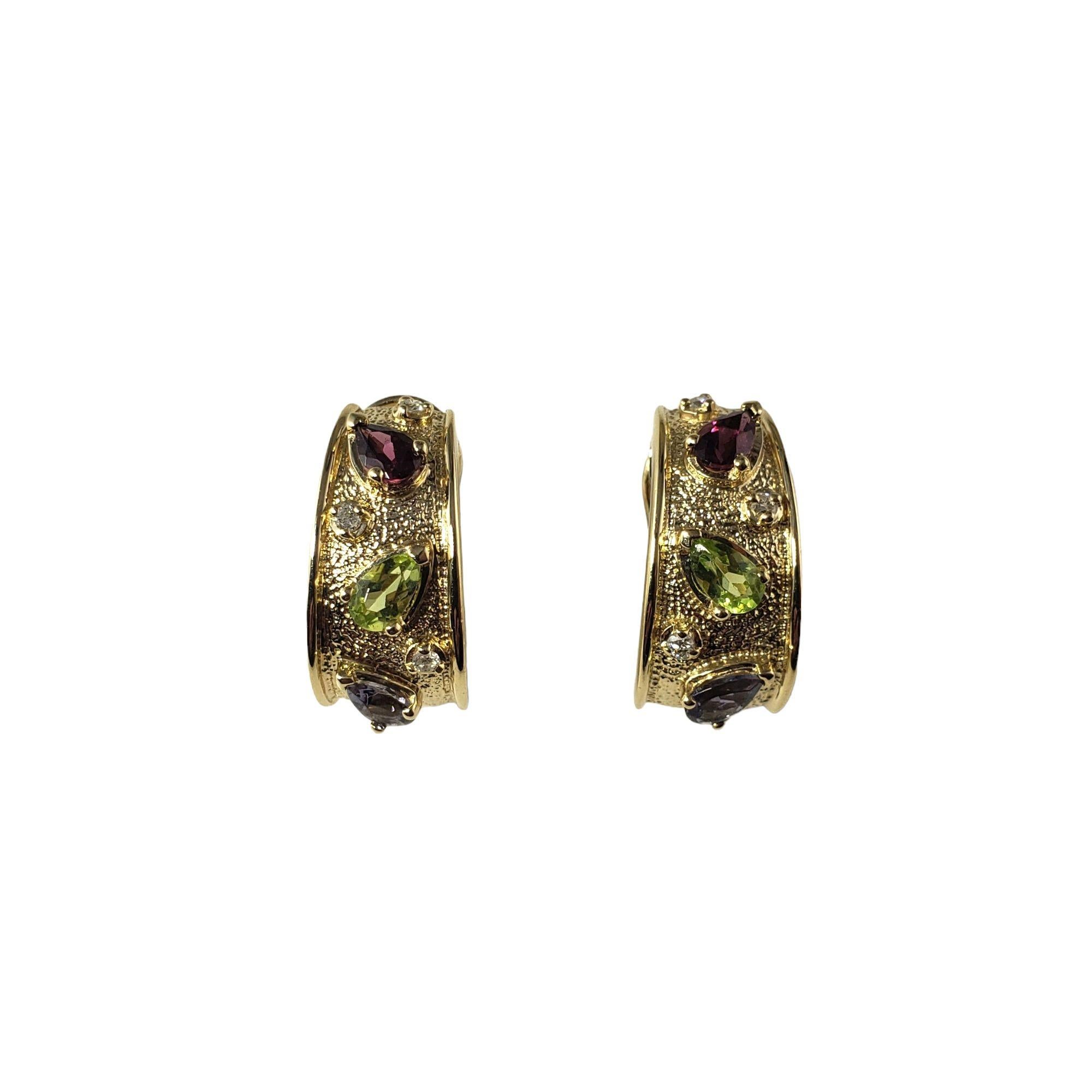These elegant earrings each feature three pear shaped gemstones and three round brilliant cut diamonds set in beautifully detailed 14K yellow gold. Omega back closures.

Approximate diamond weight: .06 ct.

Diamond color: I

Diamond clarity: