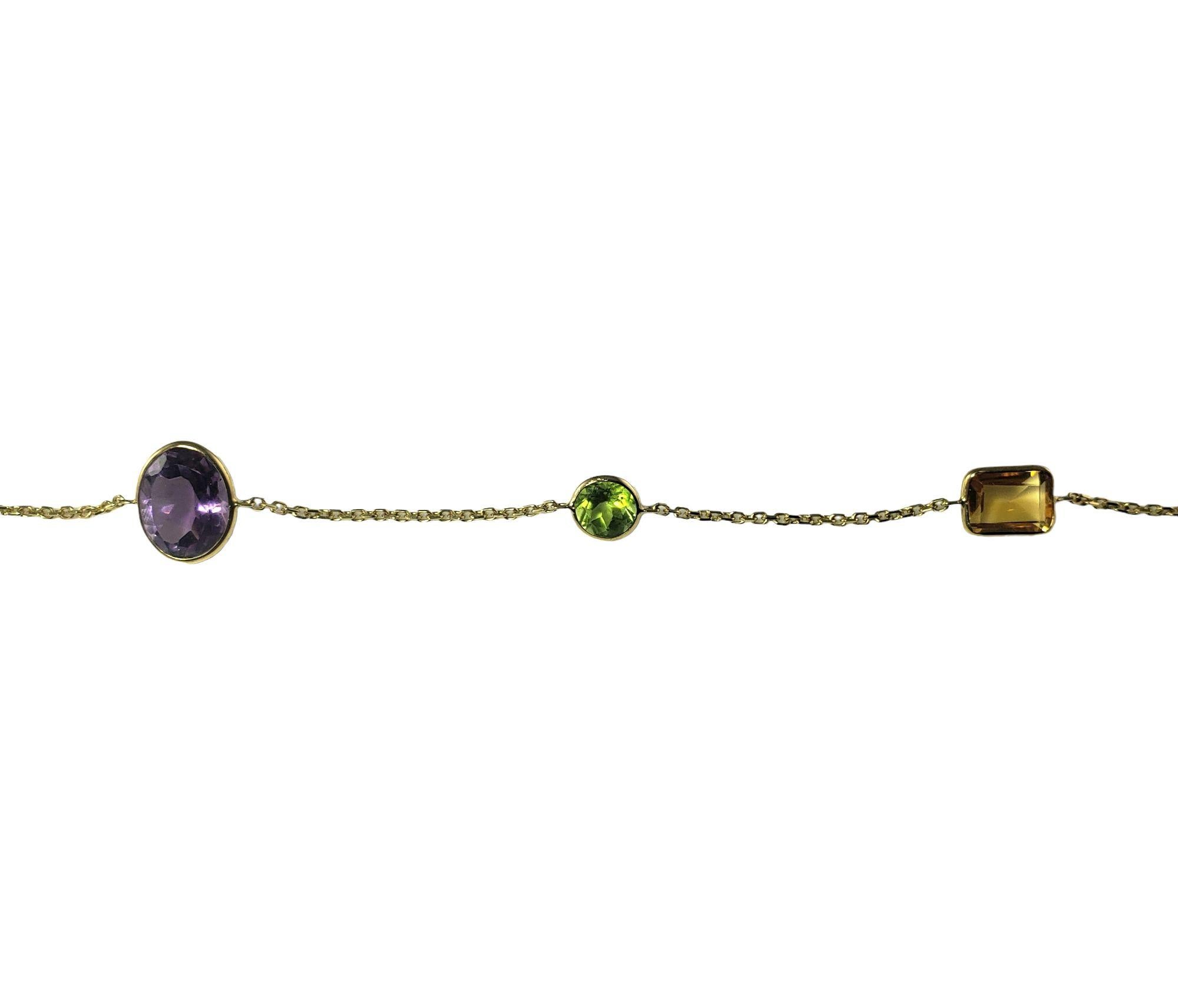 This elegant necklace features one square smoky quartz, five citrines, five blue topaz, three peridots, two garnets, three amethysts and one prasiolite set in classic 14K yellow gold.

Total gemstone weight:  43.5 ct.

Size: 30 inches

Weight:  13.4