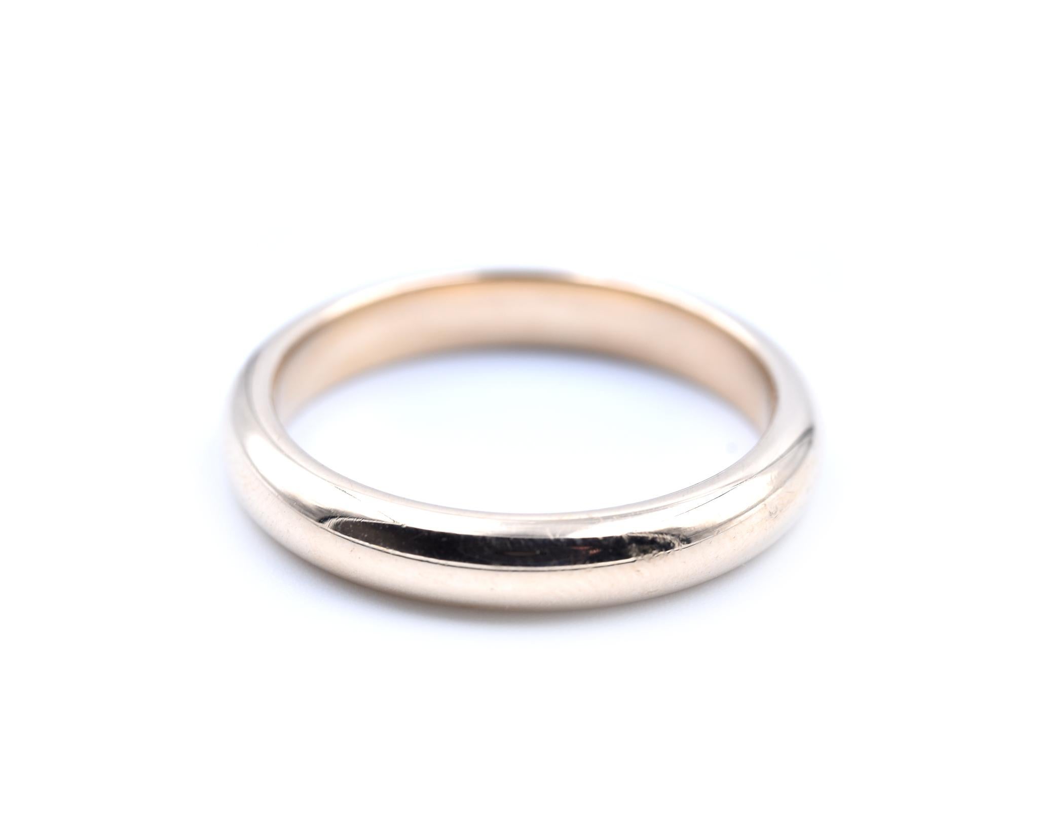 Designer: custom design
Material: 14k yellow gold
Dimensions: ring is 4mm wide
Ring Size: 11 1/4 (please allow two additional shipping days for engraving and sizing)
Weight: 7.72 grams
