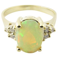 14 Karat Yellow Gold Genuine Opal and Diamond Ring