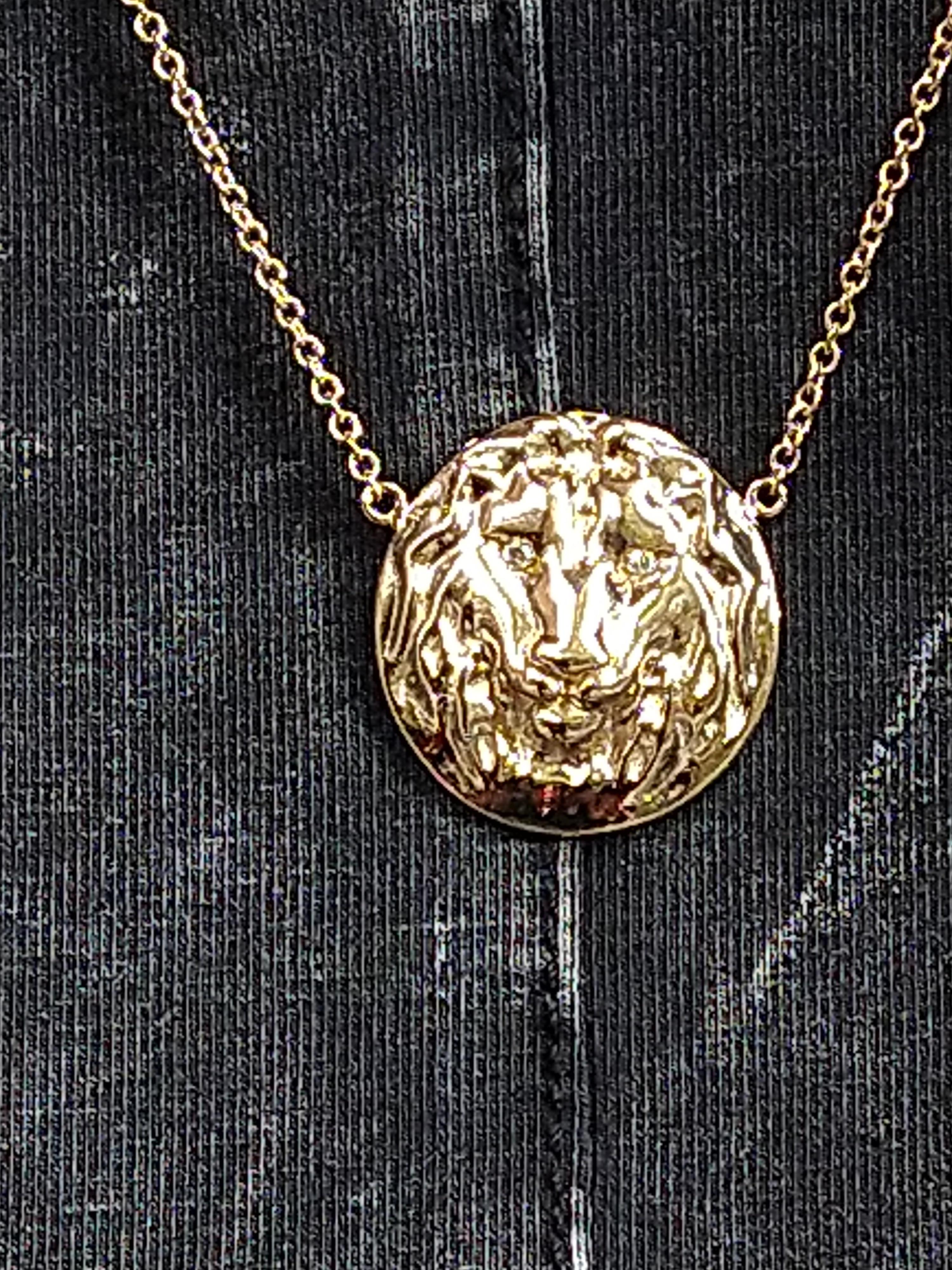 Tiffany Designer, Thomas Kurilla created 14 Karat Yellow Gold Diamond Lion Pendant, 
The king of the jungle. Fearless, territorial, and fighters. Symbolic for many reasons. Now you can get your own and not even bother feeding it! Let it feed your