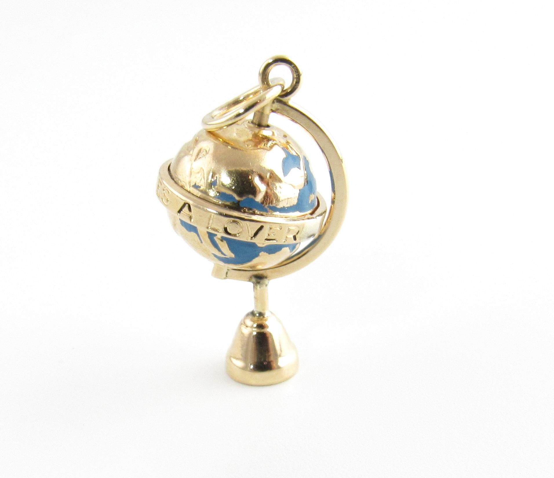 Vintage 14 Karat Yellow Gold Globe Charm

Take a trip around the world!

This lovely 3D charm features a miniature spinning globe accented with blue enamel and crafted in beautifully detailed 14K yellow gold.

