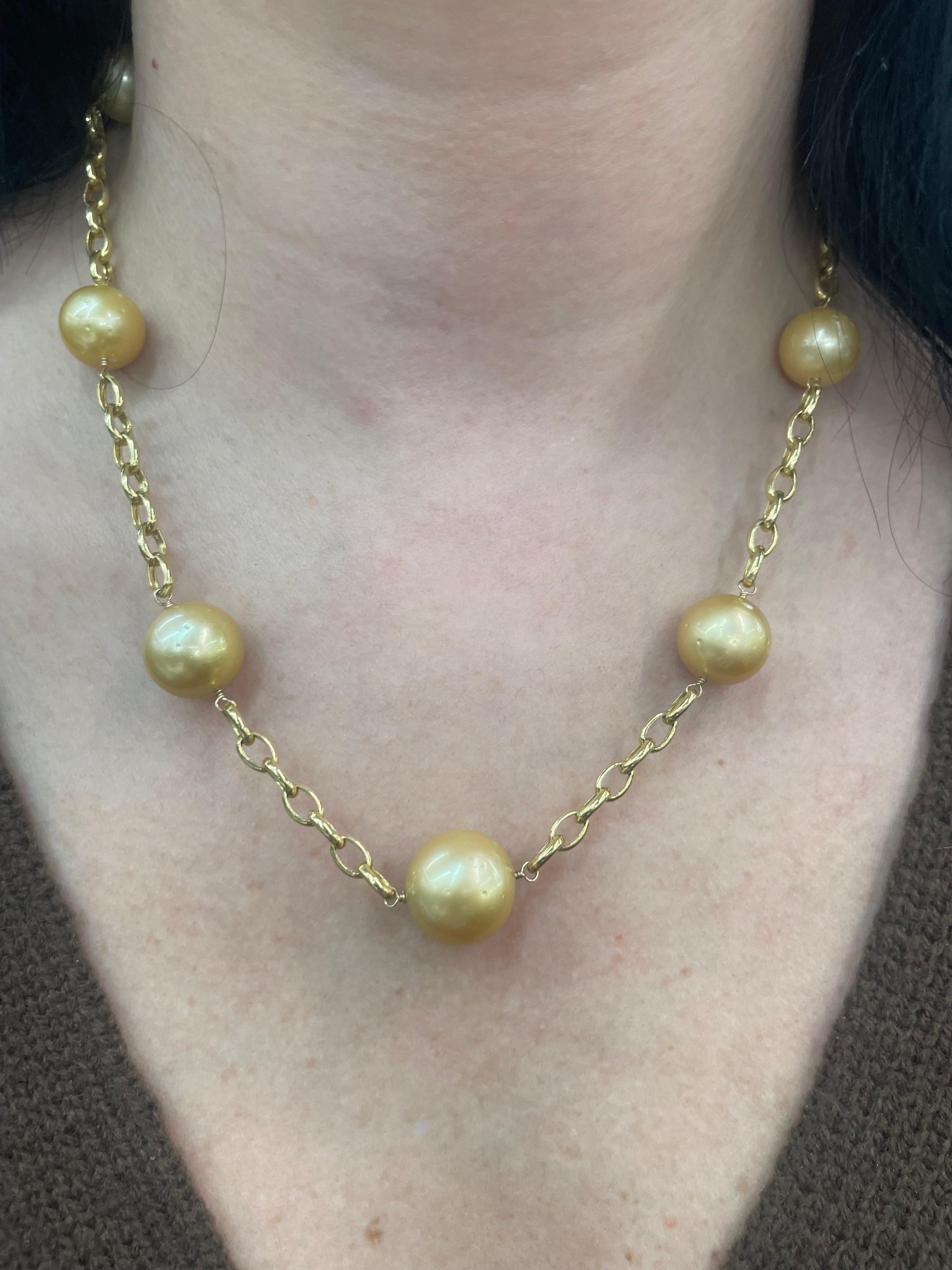 14 Karat Yellow gold necklace featuring 7 Golden South Sea Pearls measuring 12-15 MM on a oval link chain. 
Can customize in White, Pink or Tahitian Pearls.
Different Gold Colors may be available.
DM for more info and pricing. 